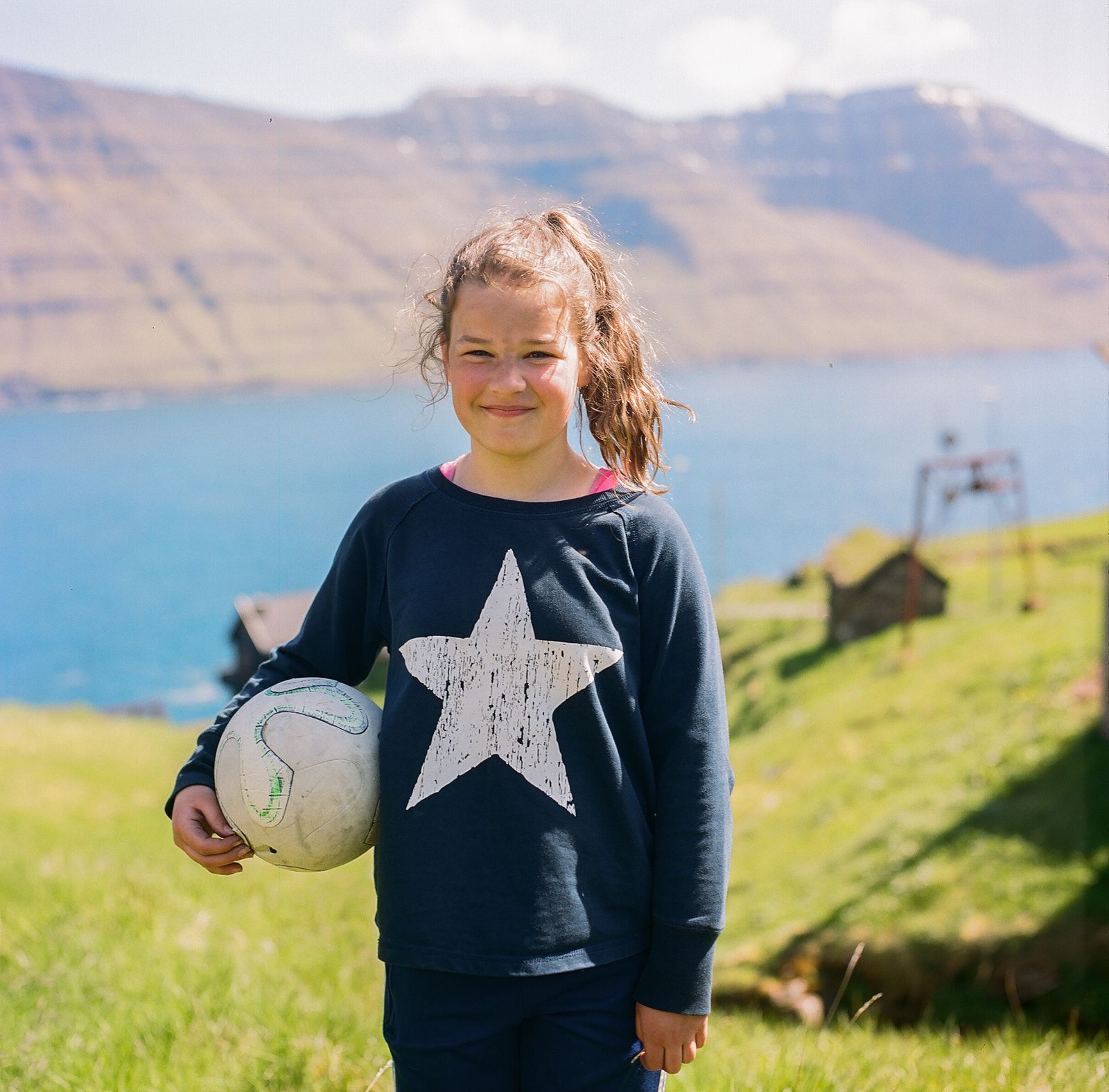 © Silvia Varela - Portrait of a Faroese girl on a school outing at Mikladur, on the Faroese island of Kalsoy.