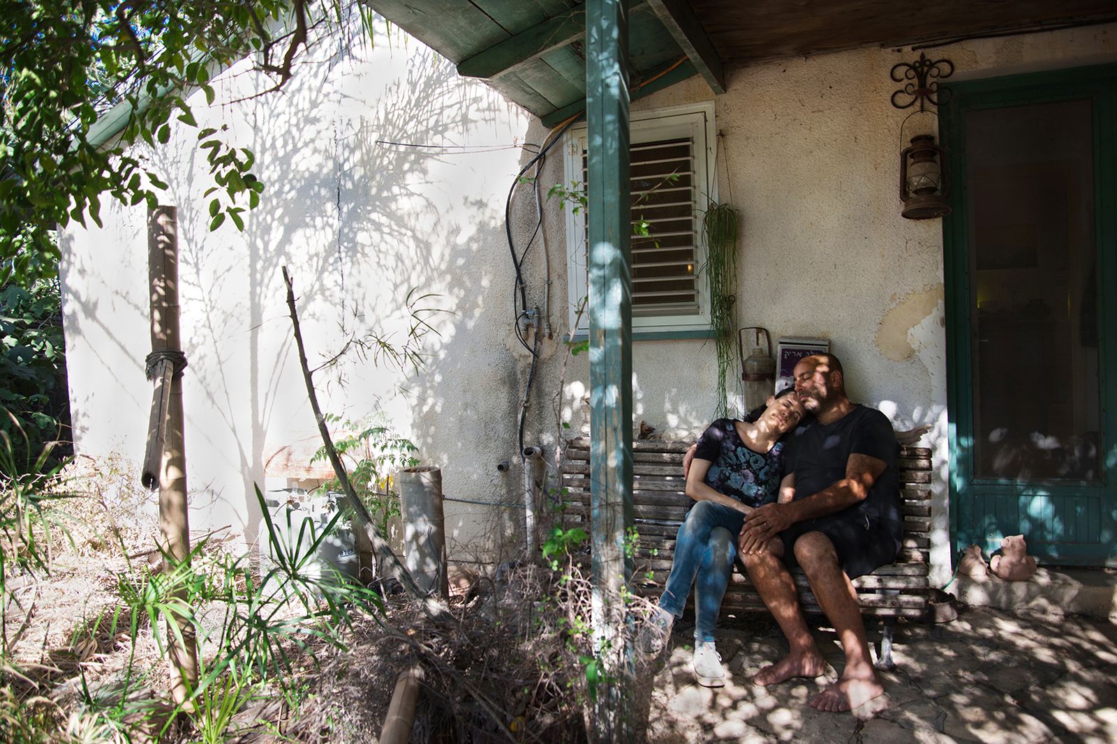 © Daniel Rolider - Arik and Irit outside our house in Shikun Ella neighborhood in Kiryat Tivon, Israel, October 2016.