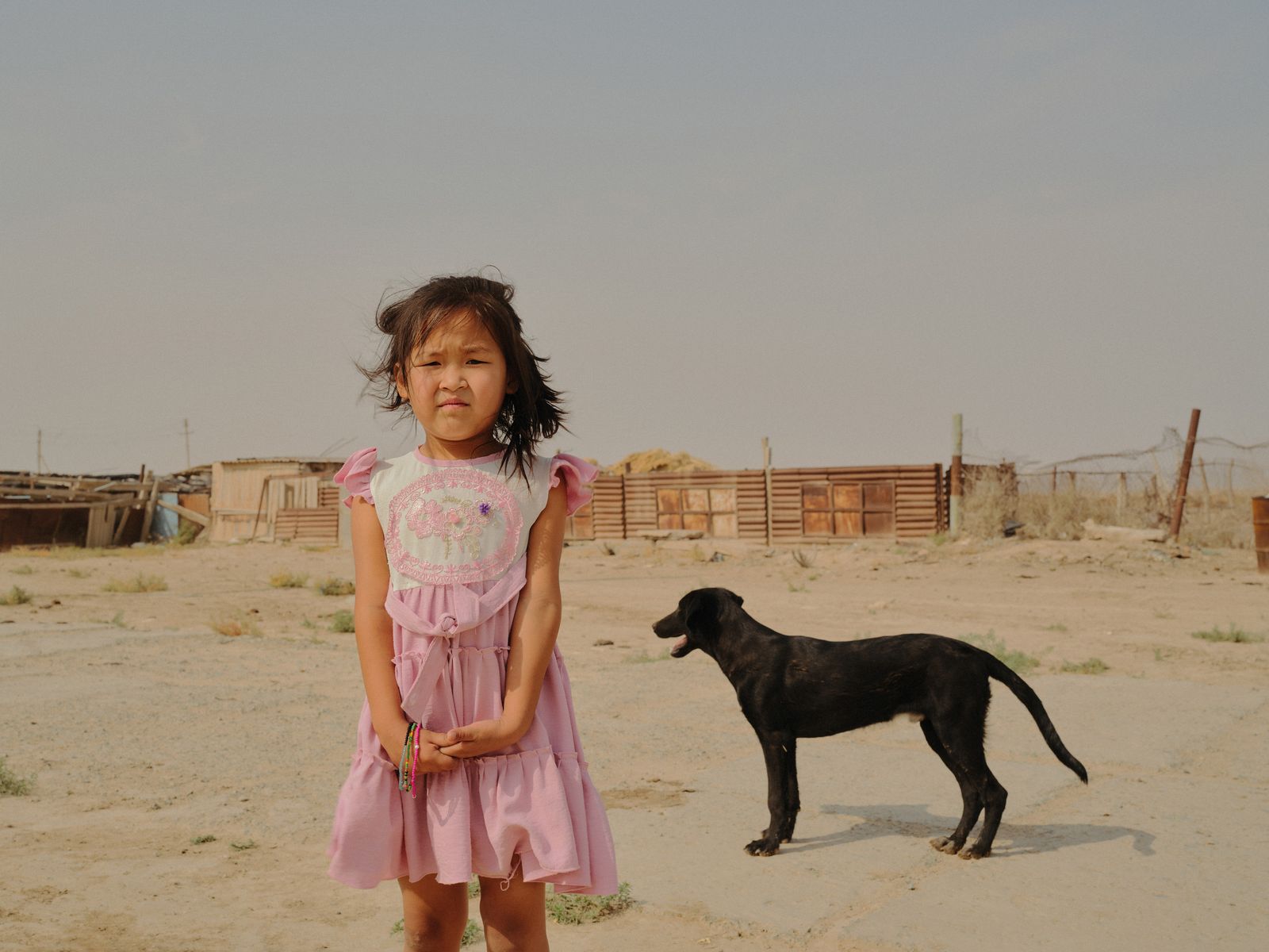 © Kristina Varaksina - A little girl in the sandy village of Komsomol’sk-na-Ustyurte.