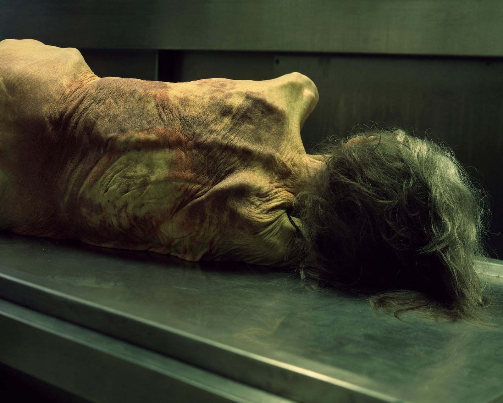 © Grzegorz Wełnicki - Deceased body of a woman, awaiting preparation for burial.