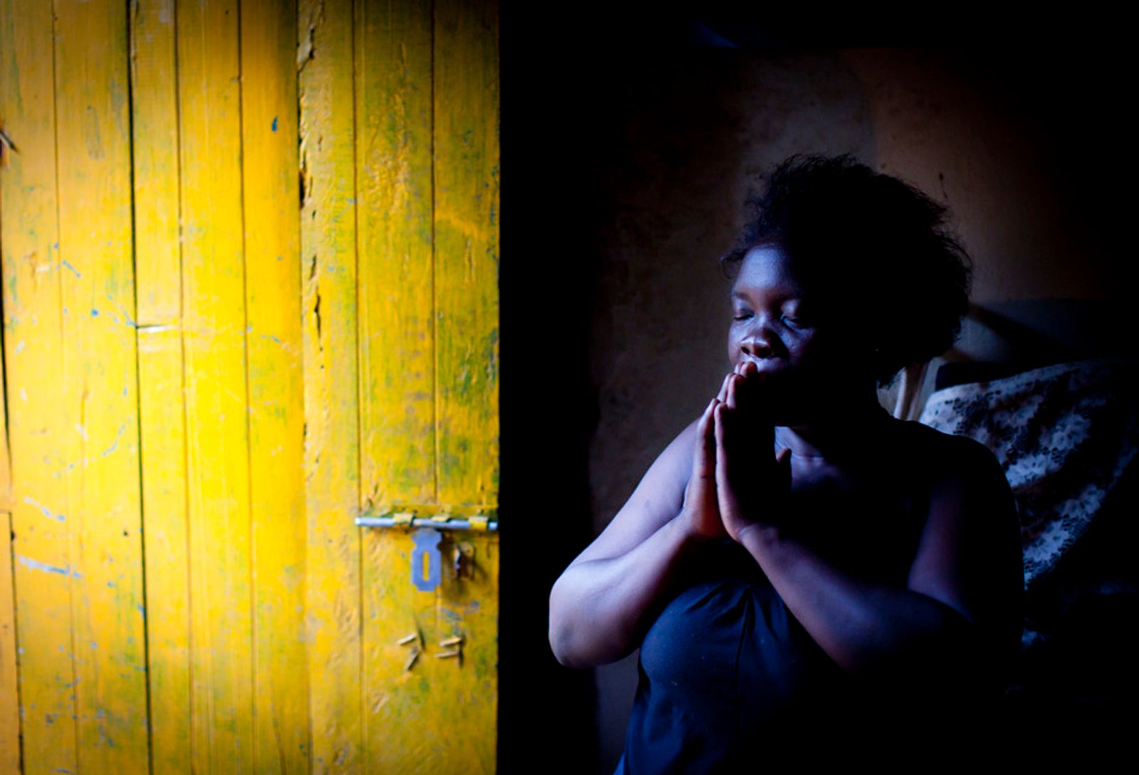 © Anne Ackermann - Irene, 29, prays a lot. She lost one of her legs when she stepped on a landmine 12 years ago.