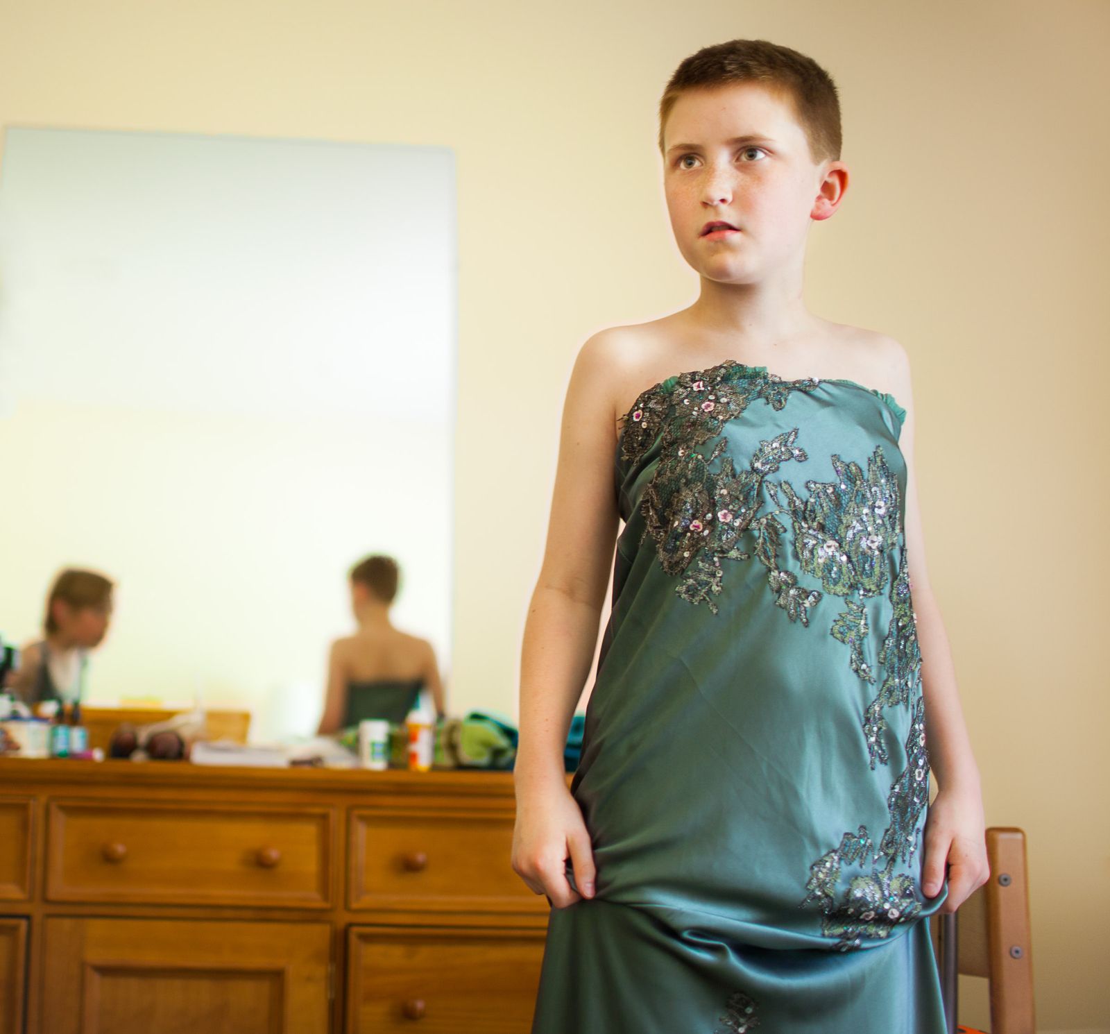 © Lindsay Morris - Preparing for the fashion show in one of many gowns donated to Camp I Am (2011).
