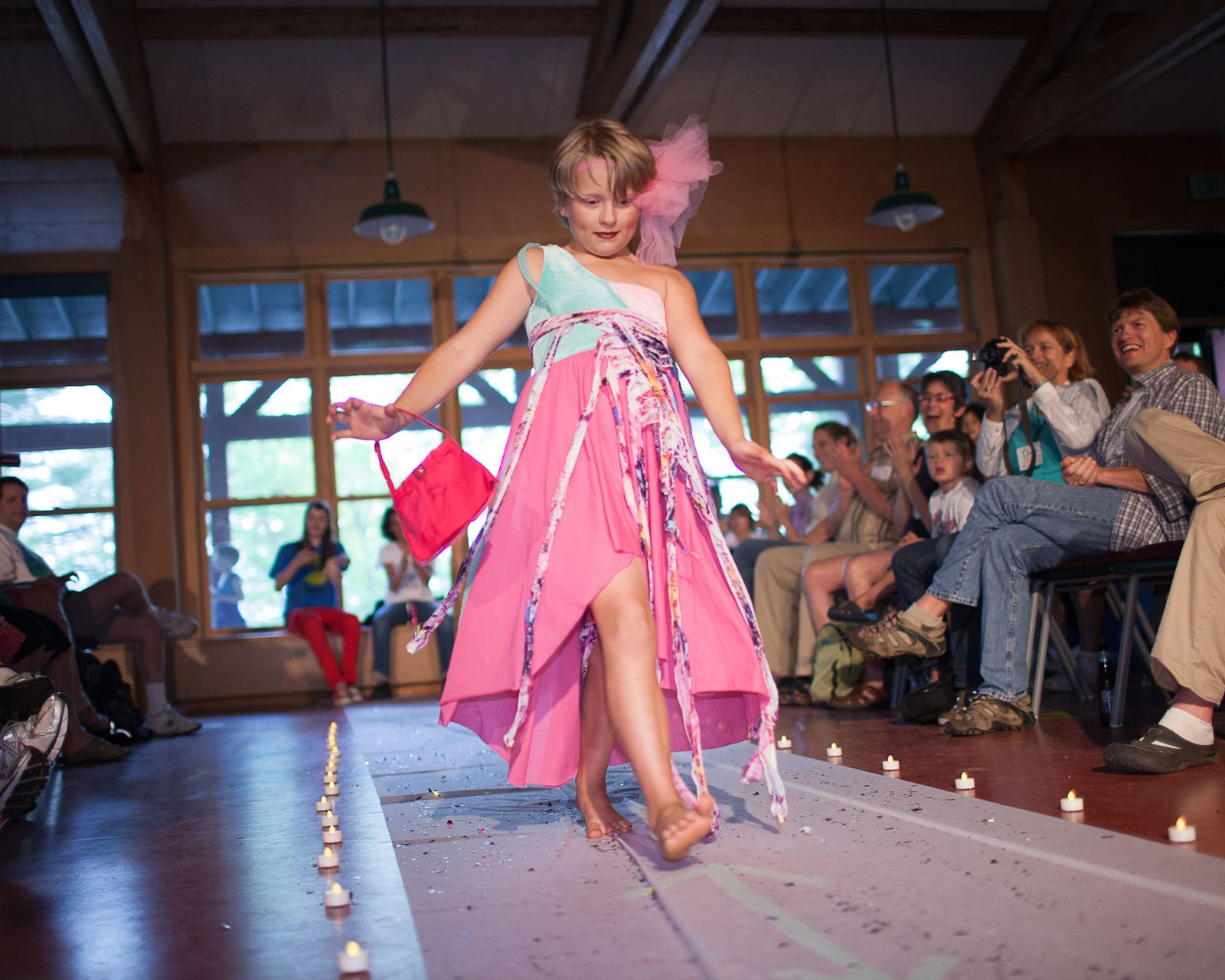 © Lindsay Morris - Stefi in 2011 walking the fashion show runaway as family members show their support.