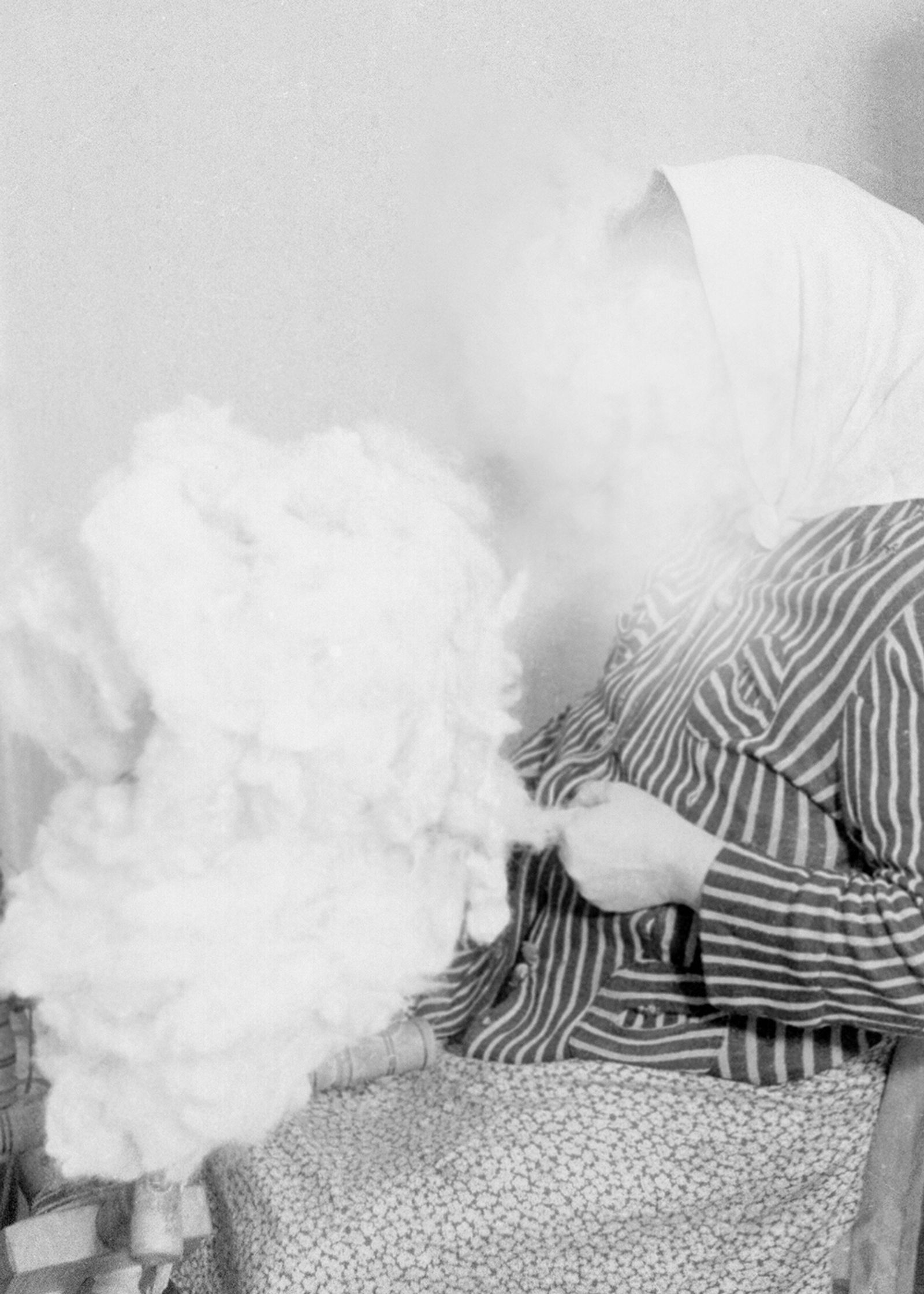 © Emilia Martin - "babooshka / diptych part 2" (2024) An obstructed archival photograph found in the Polish national photographic archives