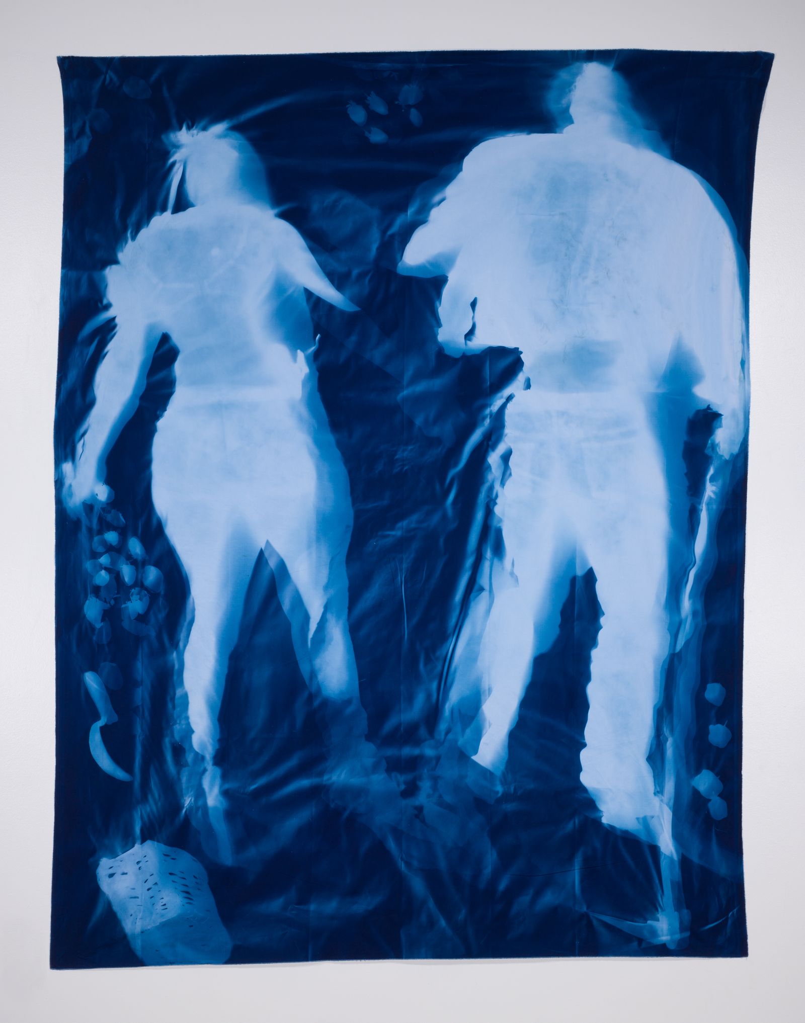 © Jackie Neale - Crossing Over: Immigration Stories, 2018 Cotton fabric cyanotype portraits 5x7ft