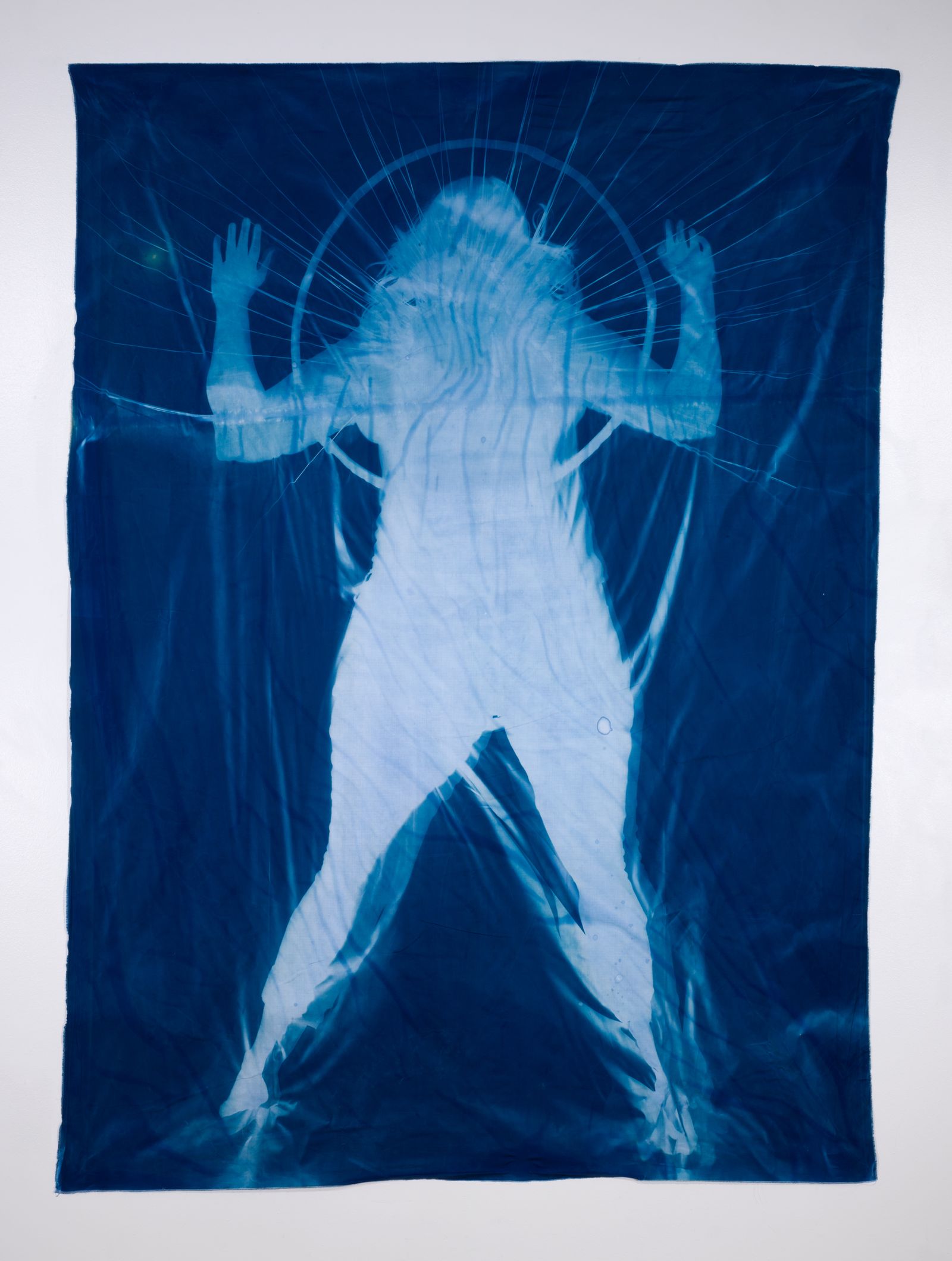 © Jackie Neale - Crossing Over: Immigration Stories, 2017 Cotton fabric cyanotype portraits 5x7ft