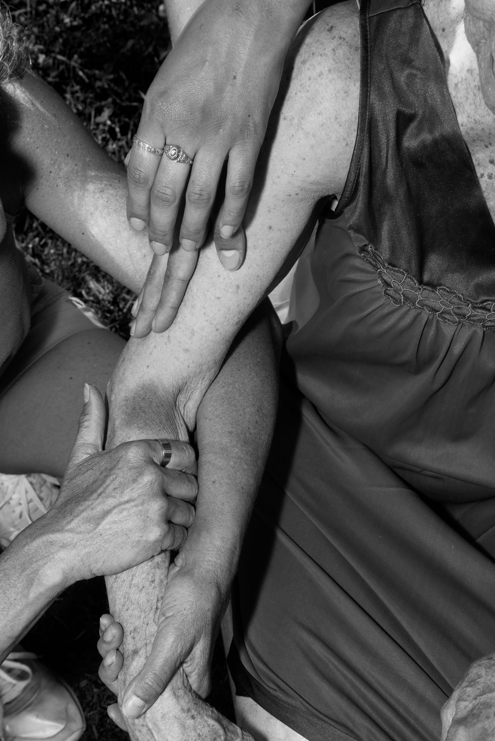 © Jillian Freyer - People lay their hands on Germaine to help her heal.