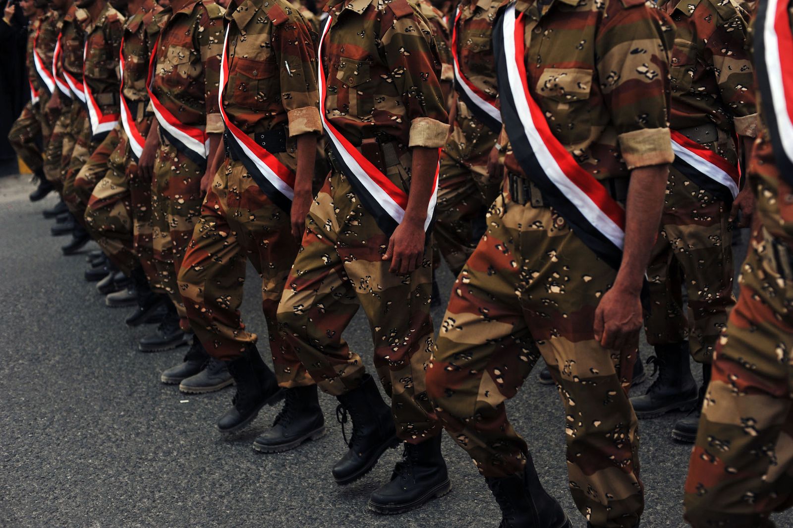 © Alex Potter - Members of the Yemeni military march in a parade to commemorate the end of the revolution.
