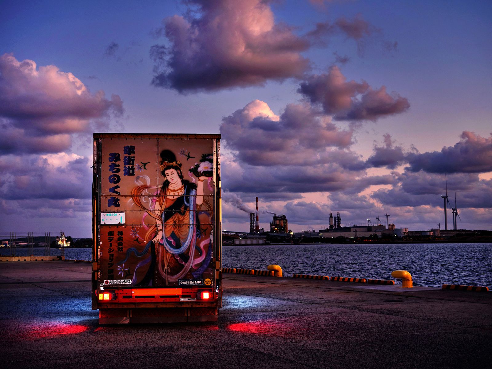 © Julie Glassberg - Michinoku Maru, a work dekotora used for car transportation. Port of Akita, Japan.