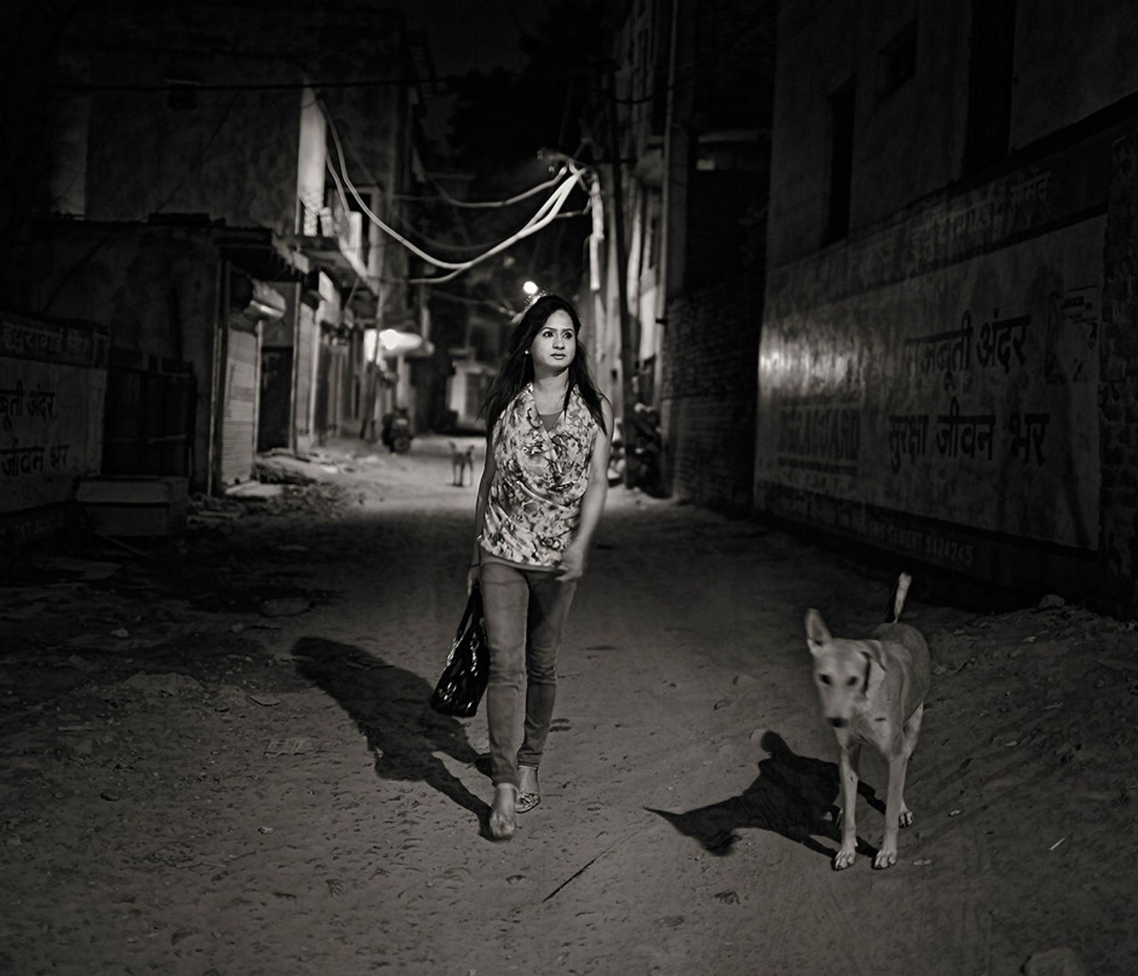 © Shahria Sharmin - Deepika's (29) journey has perhaps just begun, under the street lights of Delhi she guides no one but herself.