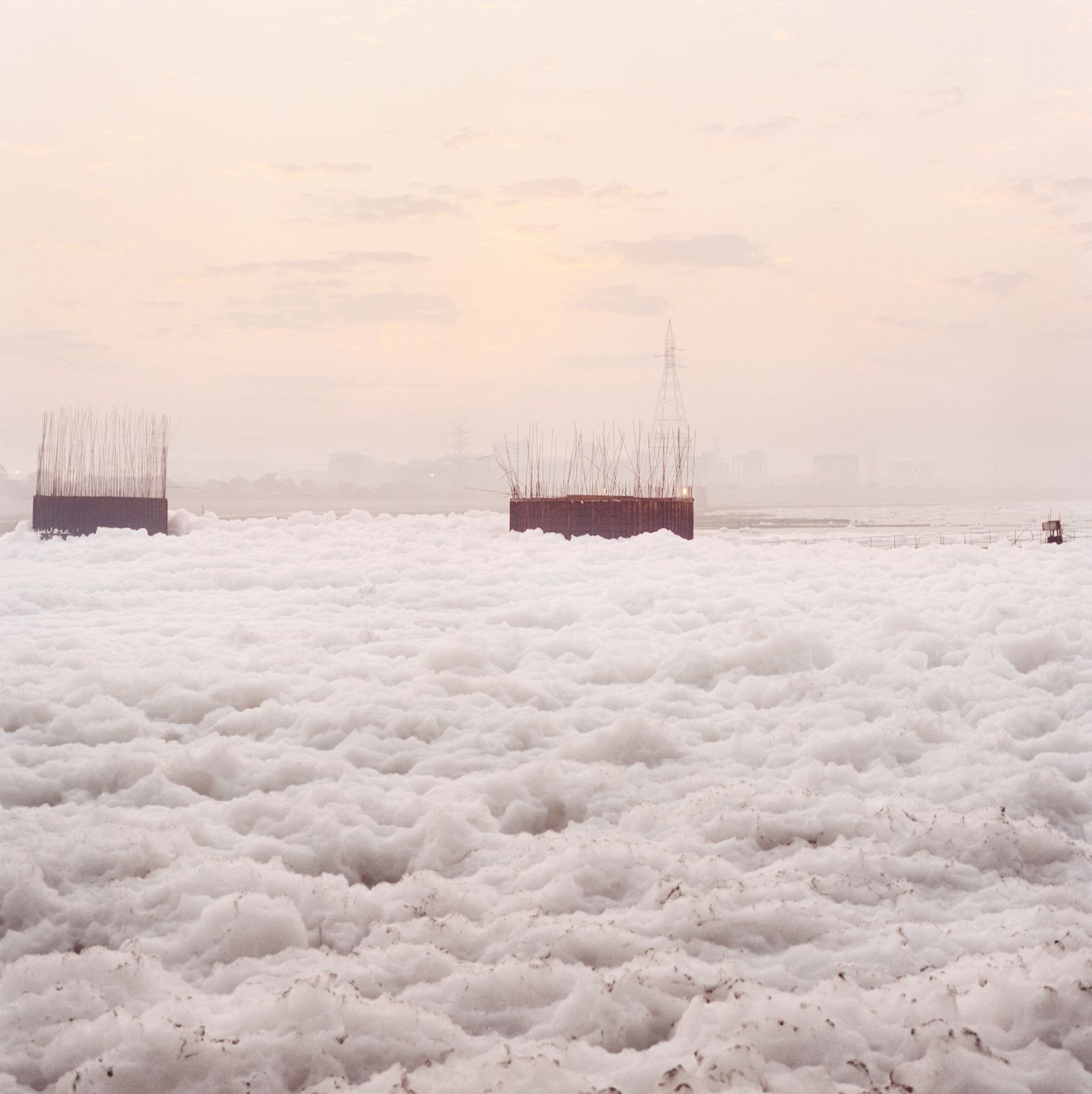 © Giulio Di Sturco - an iceberg of foam form Chimical Waste dumped by factories along the Yamuna river.