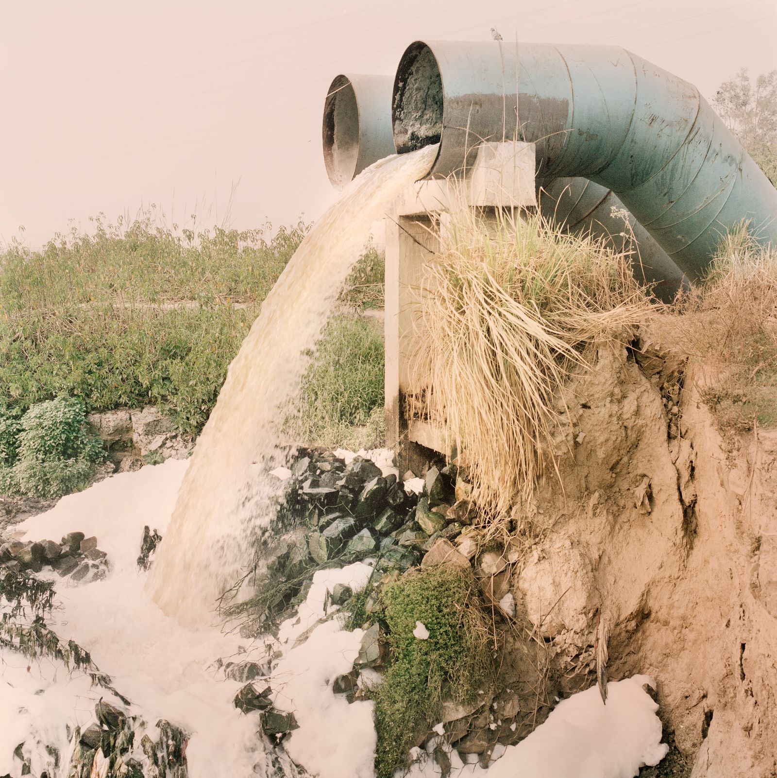 © Giulio Di Sturco - an iceberg of foam form Chimical Waste dumped by factories along the Yamuna river.