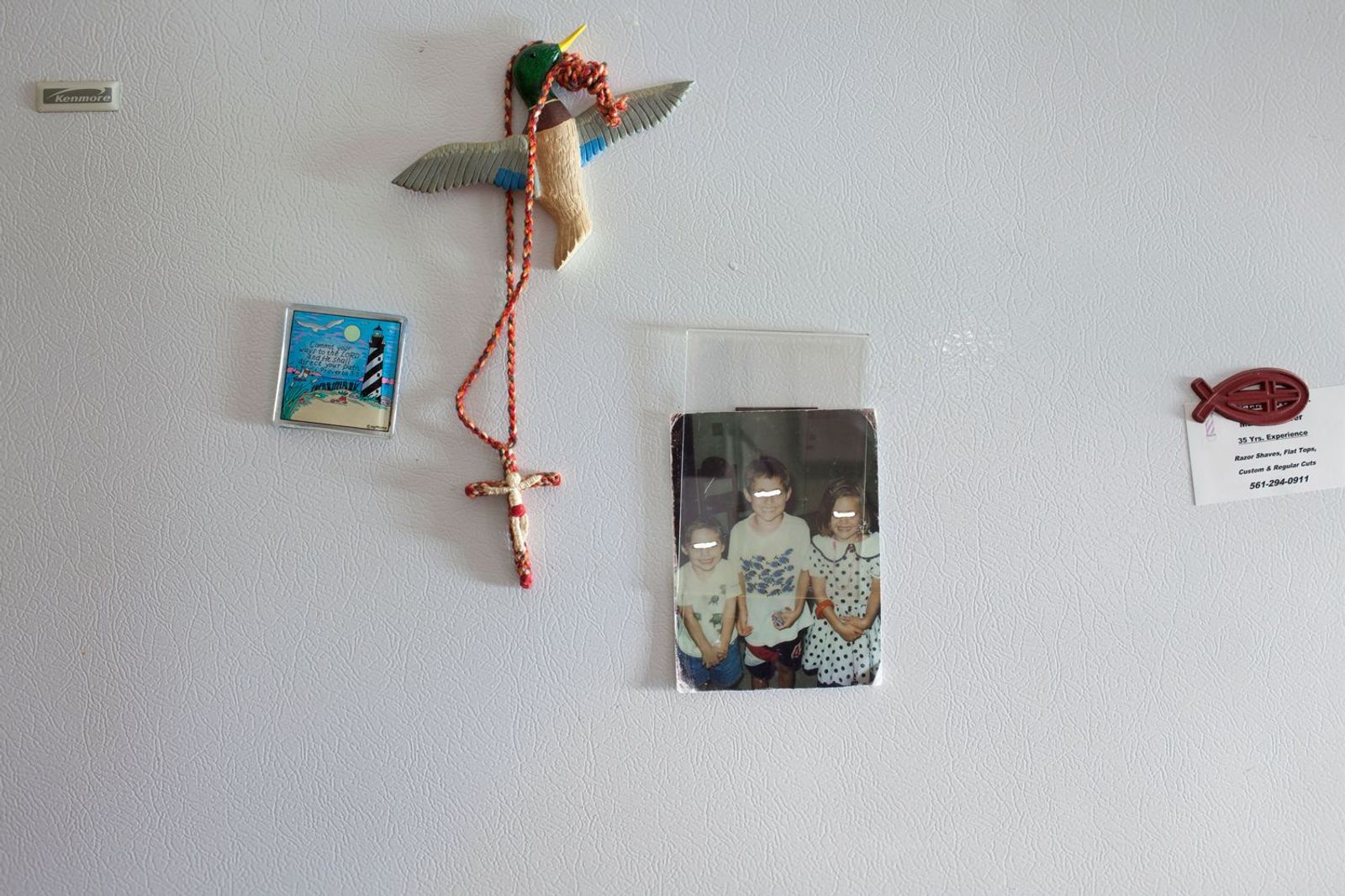 © Sofia Valiente - Rose's refrigerator with an image of her kids. The last time she saw them was many years ago.