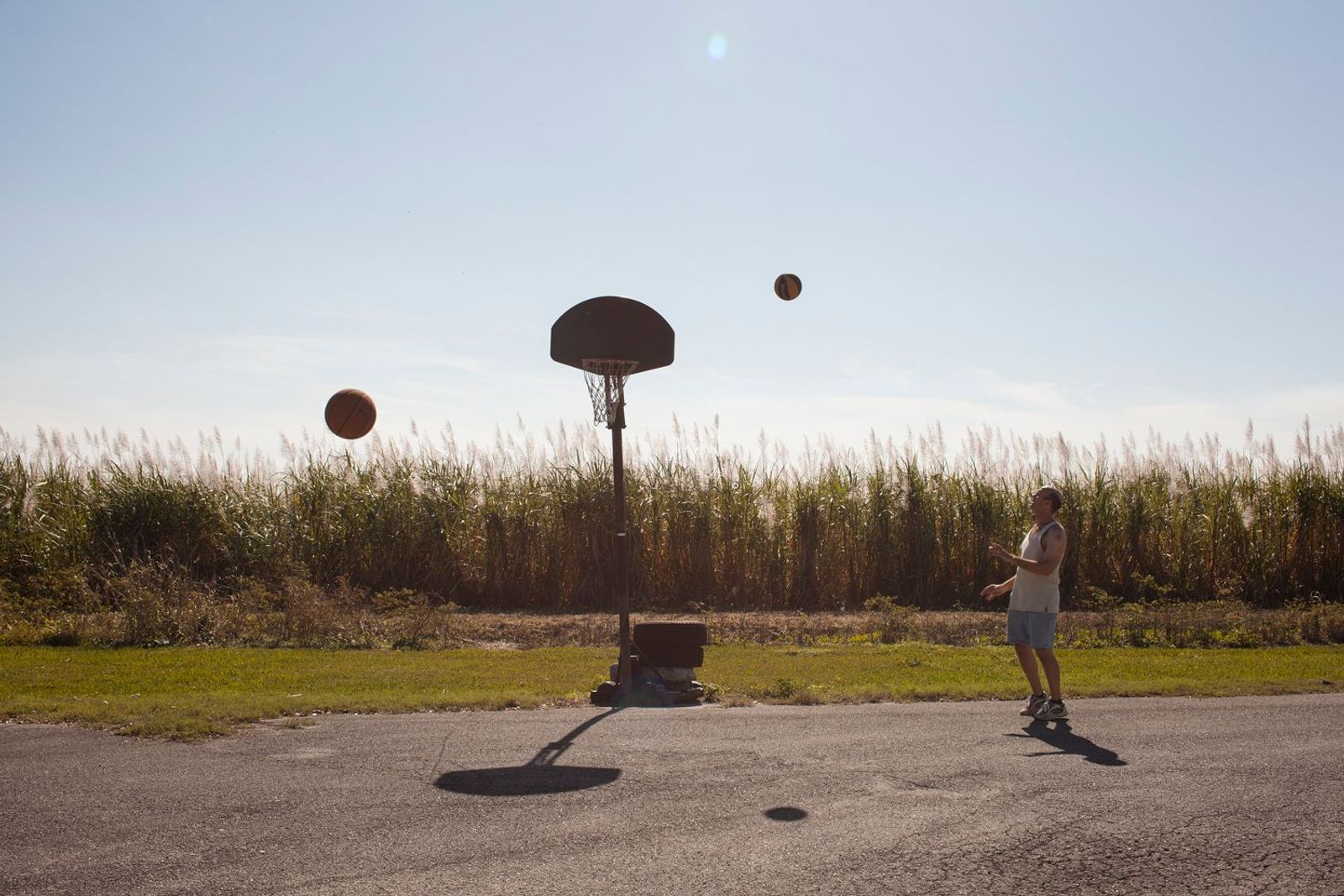 © Sofia Valiente - Richard playing basketball in the village.