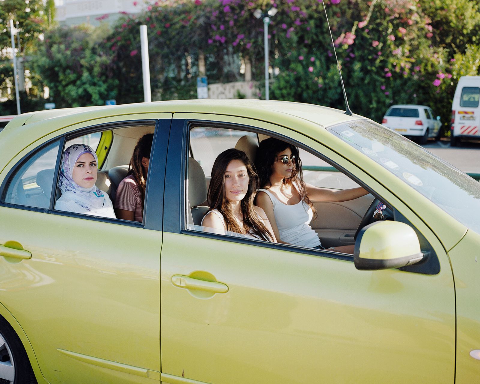 © Iris Hassid Segal - Samar, Saja, Aya and Manar, Green Car, (Sheikh Munis)Ramat Aviv, 2014