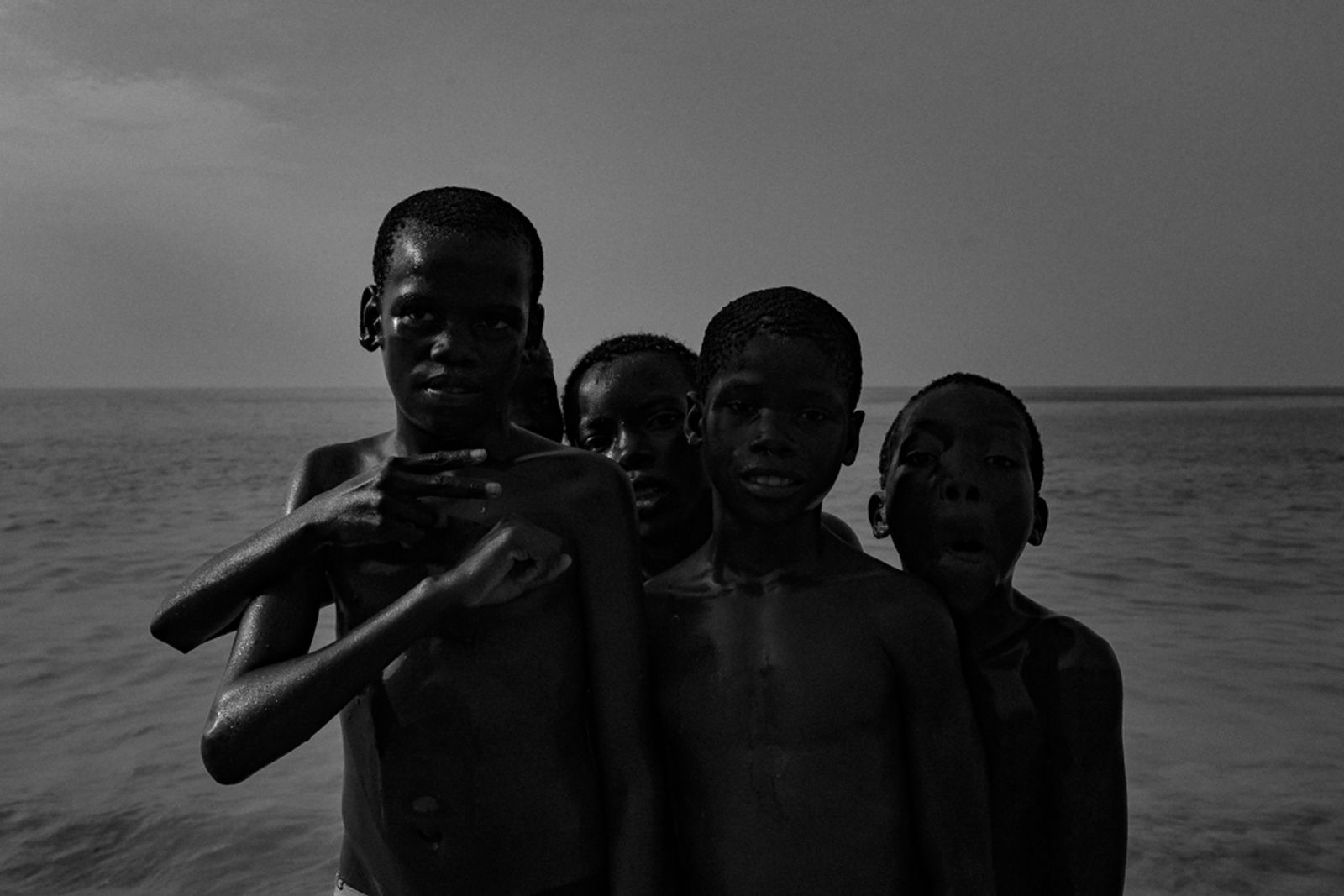 © Theo Gould - Coconut Salesmen – The few coins earned from cracking open a few coconuts allows them to buy what every kid wants: sweets.