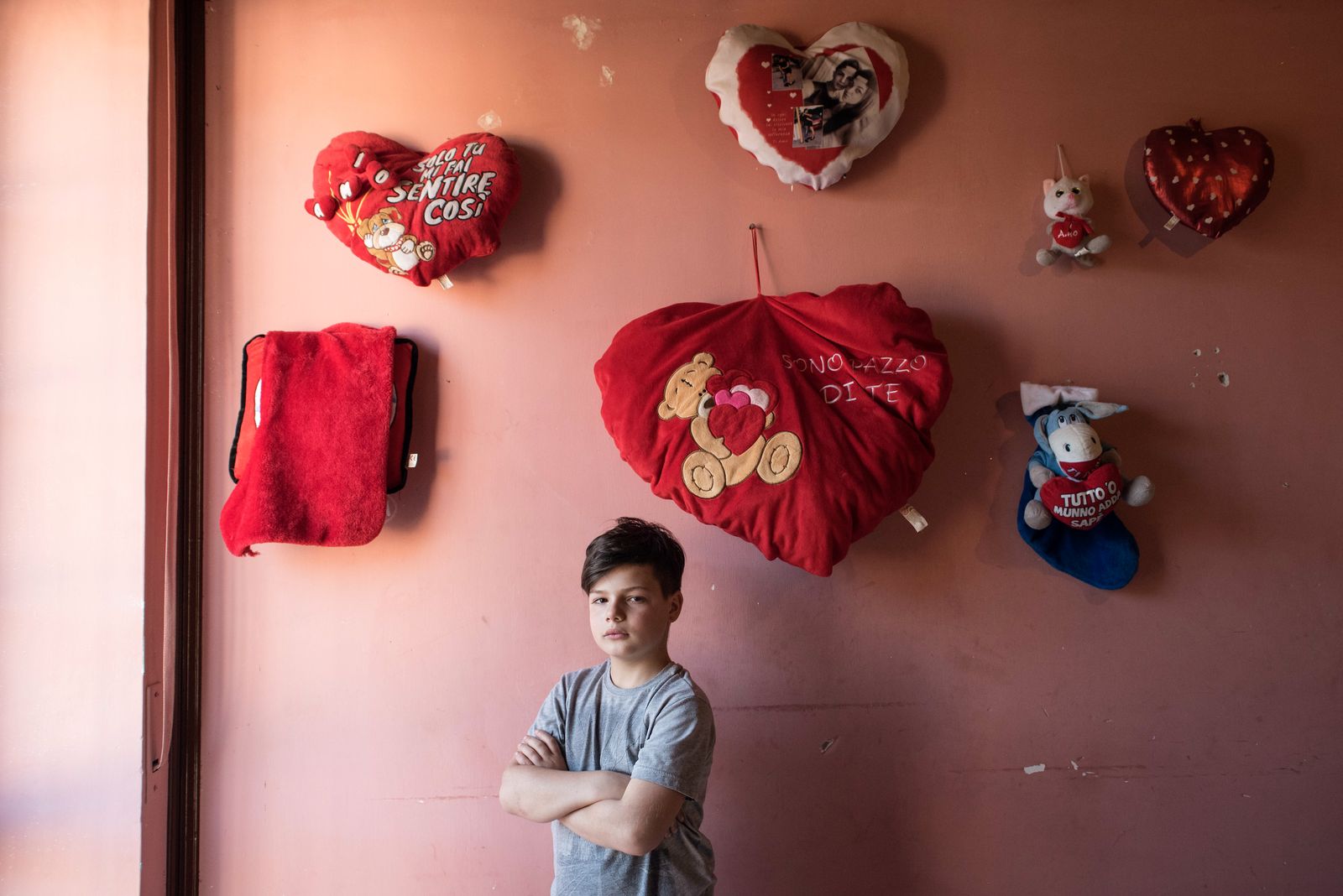 © Camillo Pasquarelli - Eman Doria, 9 years old, poses at his home in Casalnuovo.