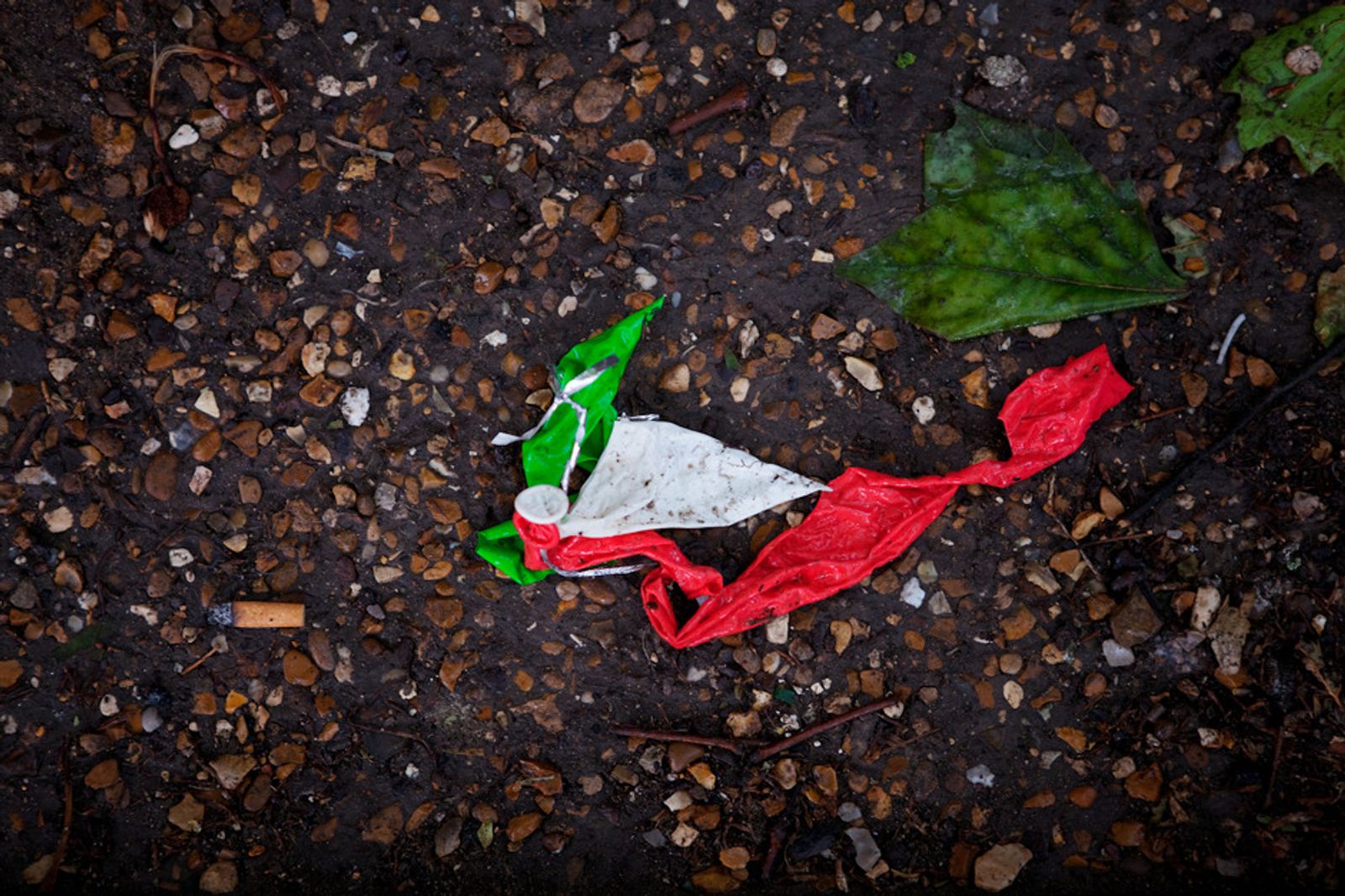 © Antonio Sansica - Italian flagged balloon during heavy rain.