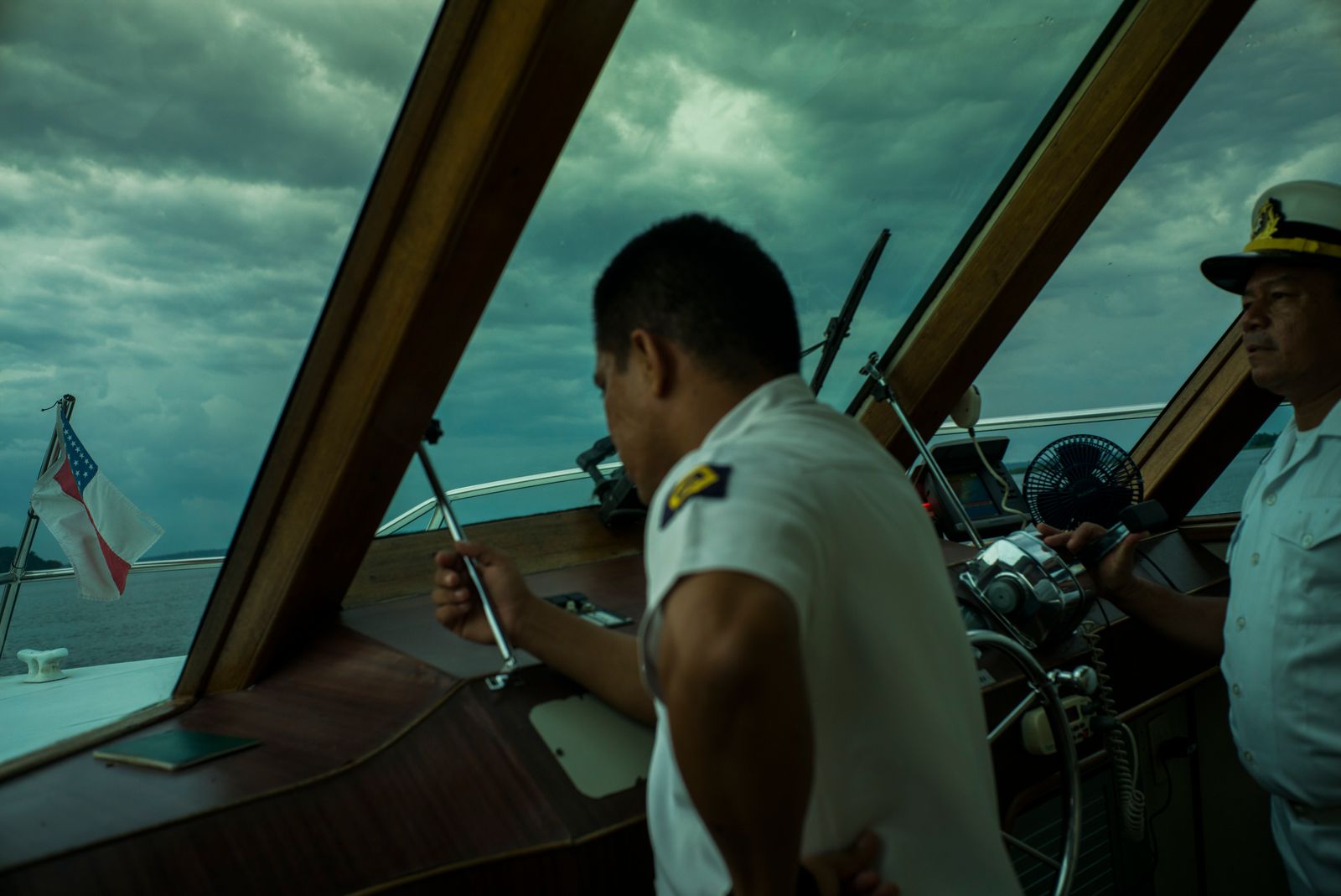 © Raphael Alves - Man sail a private boat in Negro River, Manaus, Amazonas, Brazil, on August, 27th, 2016.