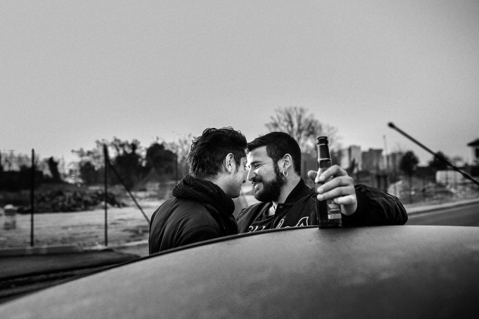 © Gianluca Abblasio - 2015 Rome - Italy. The Sun is raising. Time for the last beer with a friend.