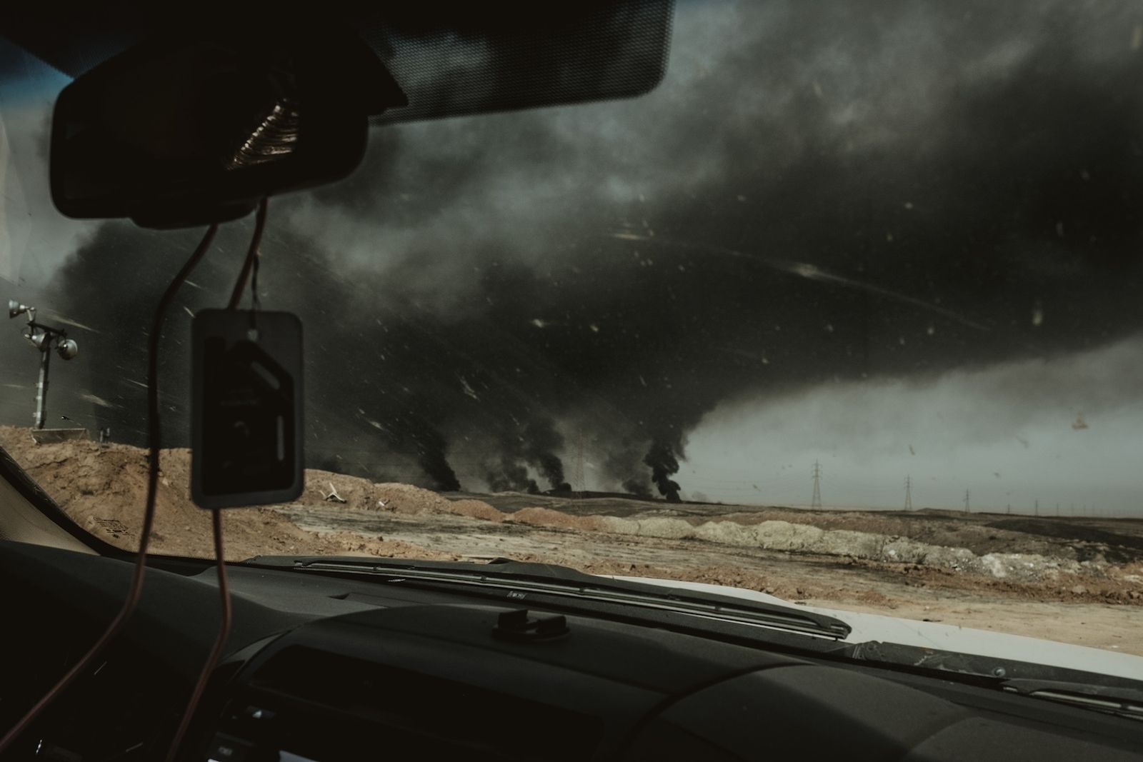 © Alexandra Howland - Oil wells burn near Qayarrah.