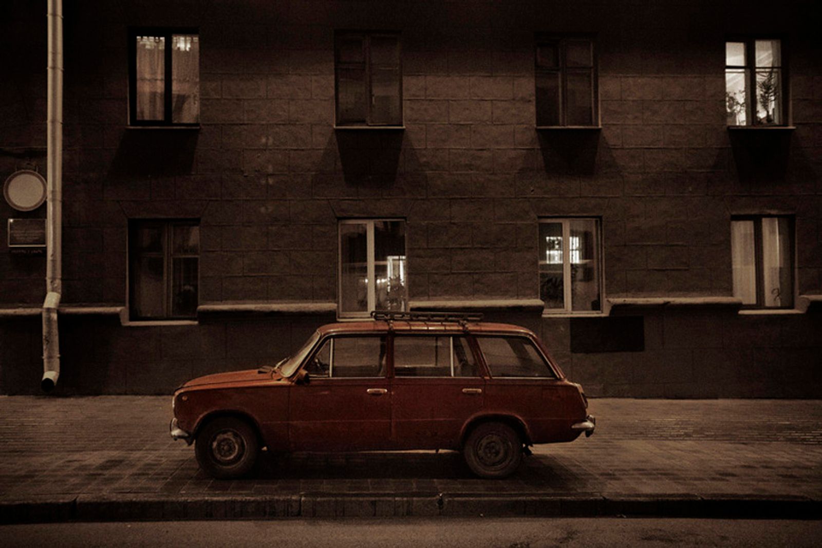 © Alessandro Vincenzi - An old car parked in Minsk city center.