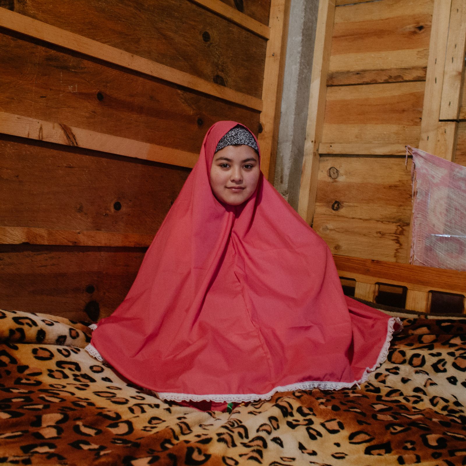 © Giulia Iacolutti - Salama Palamo Diaz in her room with her favorite hijab, a gift from foreign Muslims who have come to know the community.