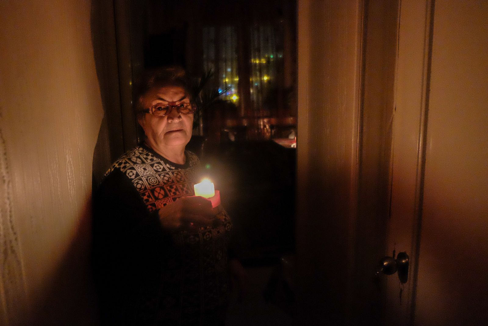© Hrant Khachatryan - In our city it occurs usually to have the electricity goes off. She always keeps a candle in her room for that case.