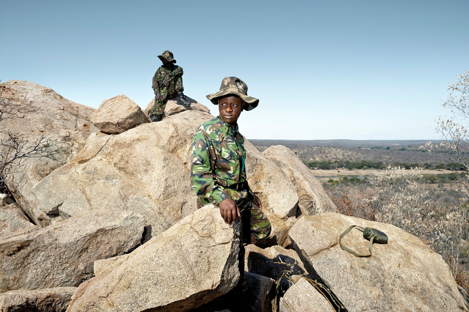 © Julia Gunther - Black Mambas Nkateko & Happy on hill top, Balule Nature Reserve, South Africa, 2015