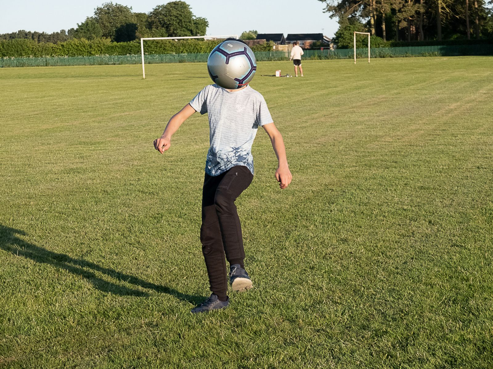 © Rich Wiles - Photo by Ruba al-Hindawi. Mustapha playing football in the local park.