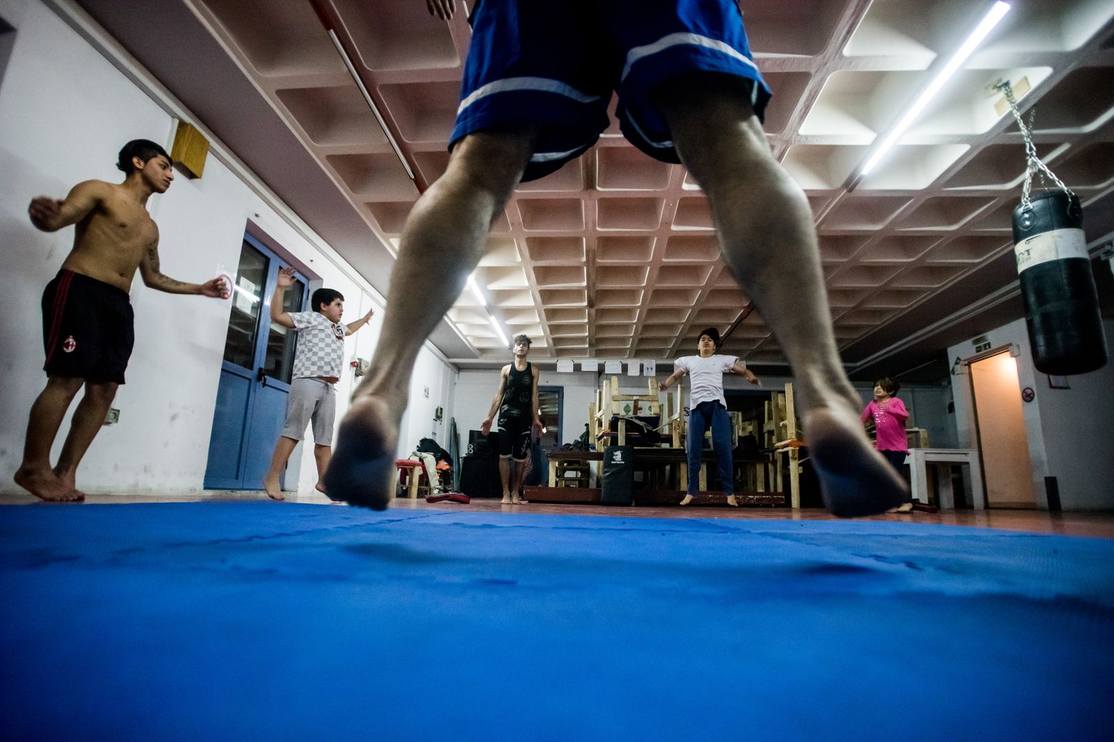 © Zoltán Balogh - Refugees work out in Khora Community Hall in Athens, Greece, 30 November 2016.