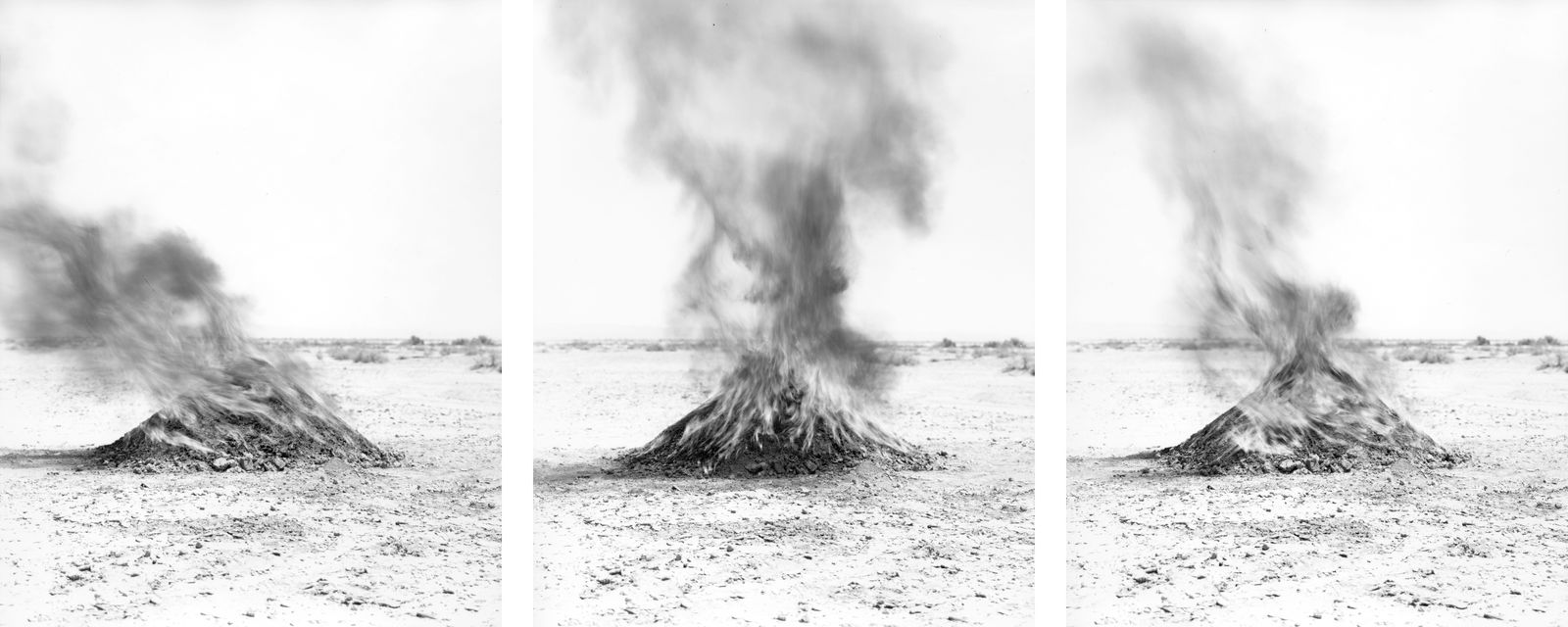 © Nicholas Albrecht - Mounds of burning soil approximately 15.1 miles from test site.