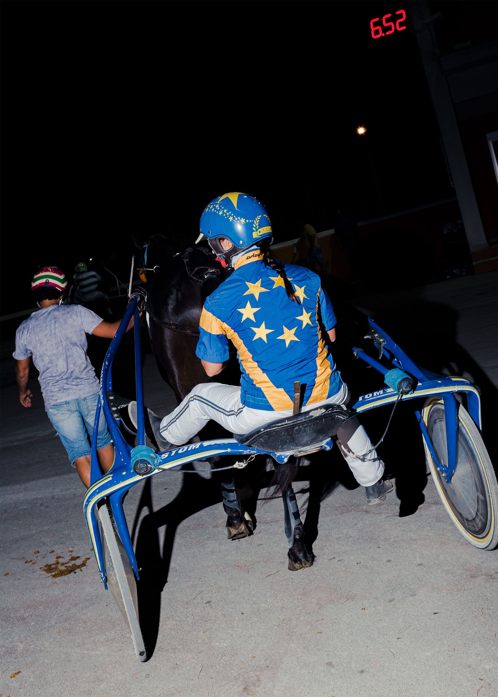© Alessio Pellicoro - A jockey entering the track on sulky.