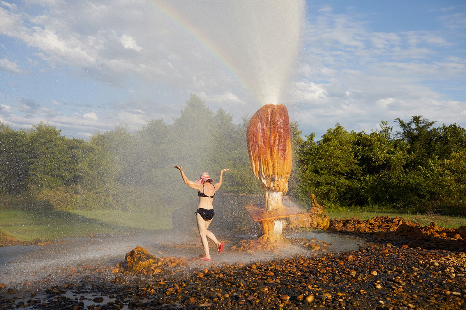 © Ksenia Kuleshova - Abkhazia, Ochamchire, 18/07/2018. The woman is enjoying the hot spring in Ochamchire.