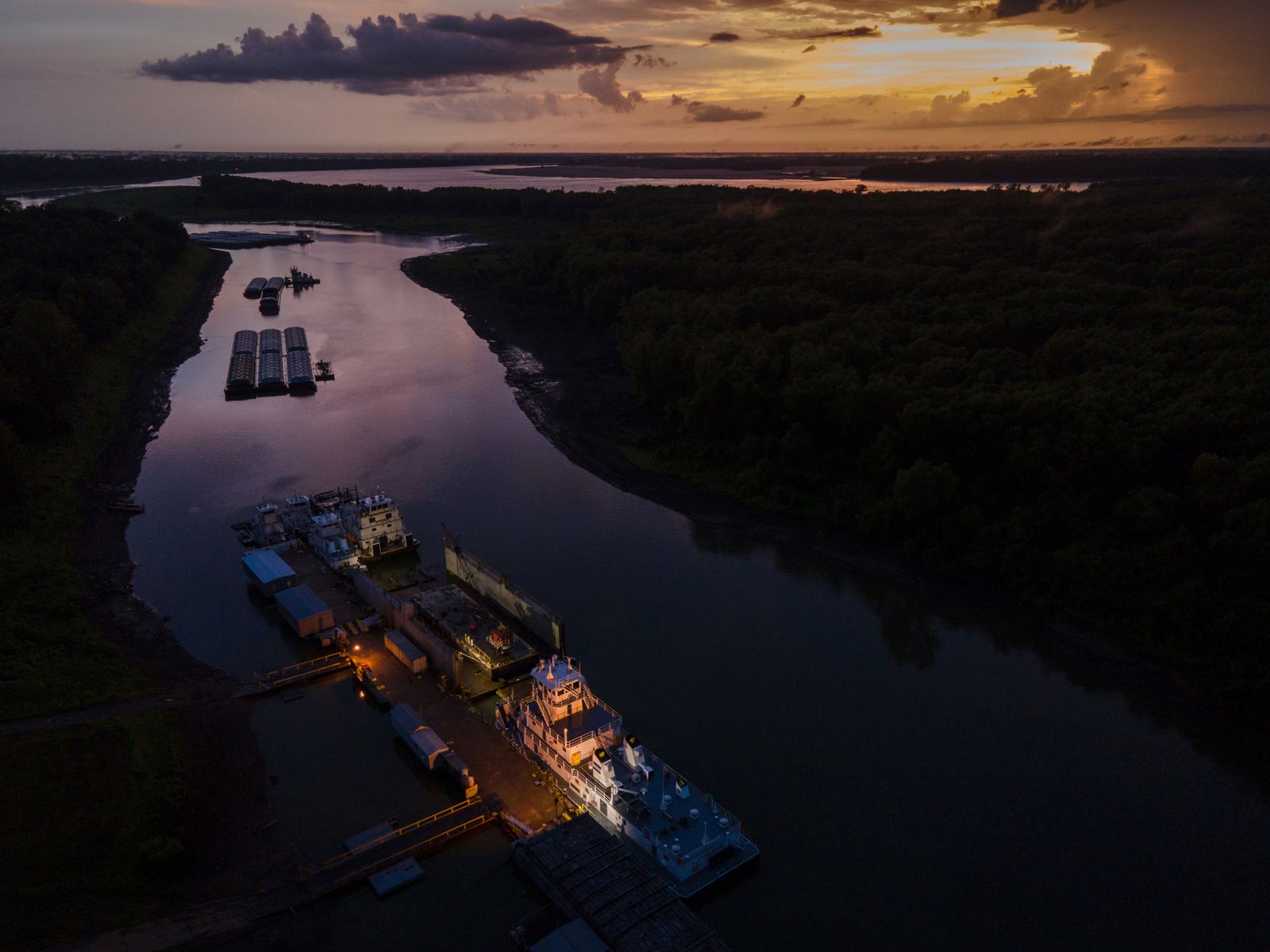 © Rory Doyle - Last light casts over the Mississippi River and the Port of Rosedale in Rosedale, Mississippi, USA.