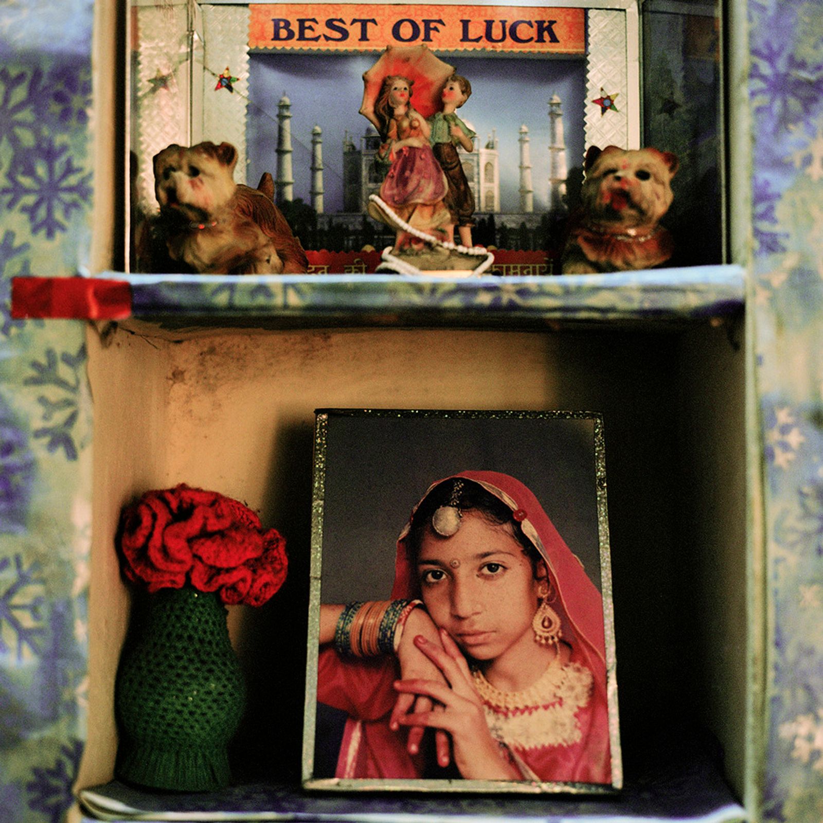 © Poulomi Basu - Photo-frame of Sheila Vishwakarma, a Kashmiri Pundit at her home in Bazpur Uttaranchal. September 2009.