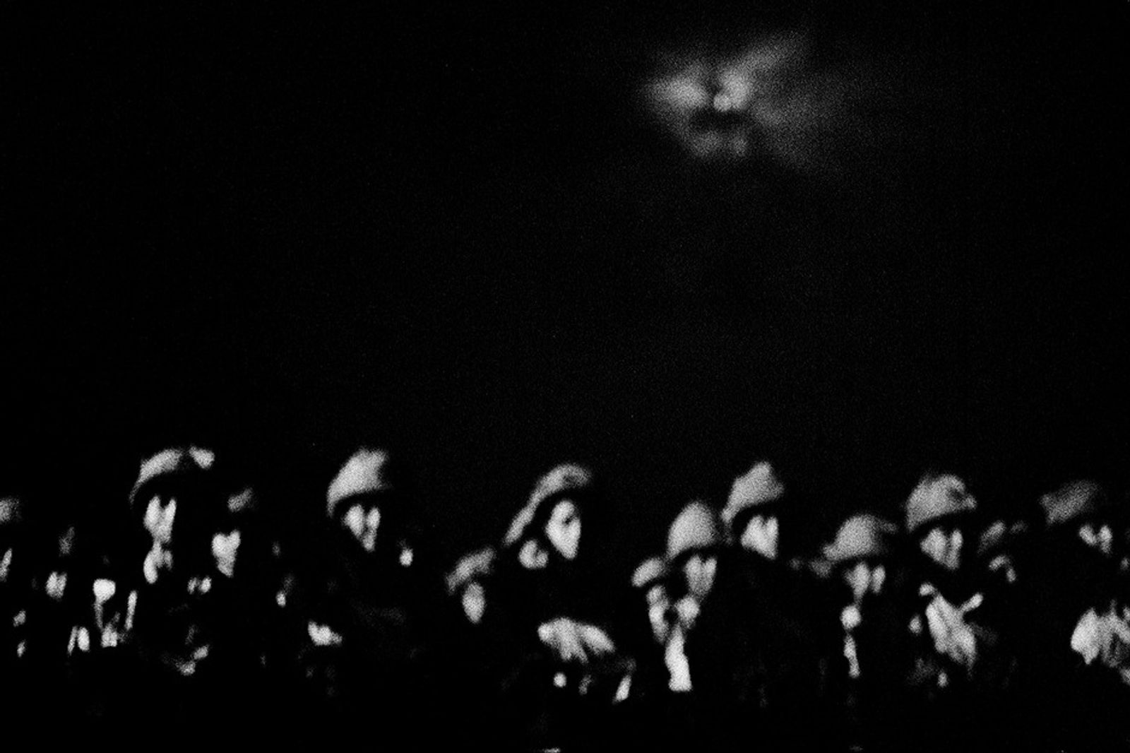 © Poulomi Basu - Invisible soldiers standing under the moonlight. Boot camp in Kharkan, August 2009.