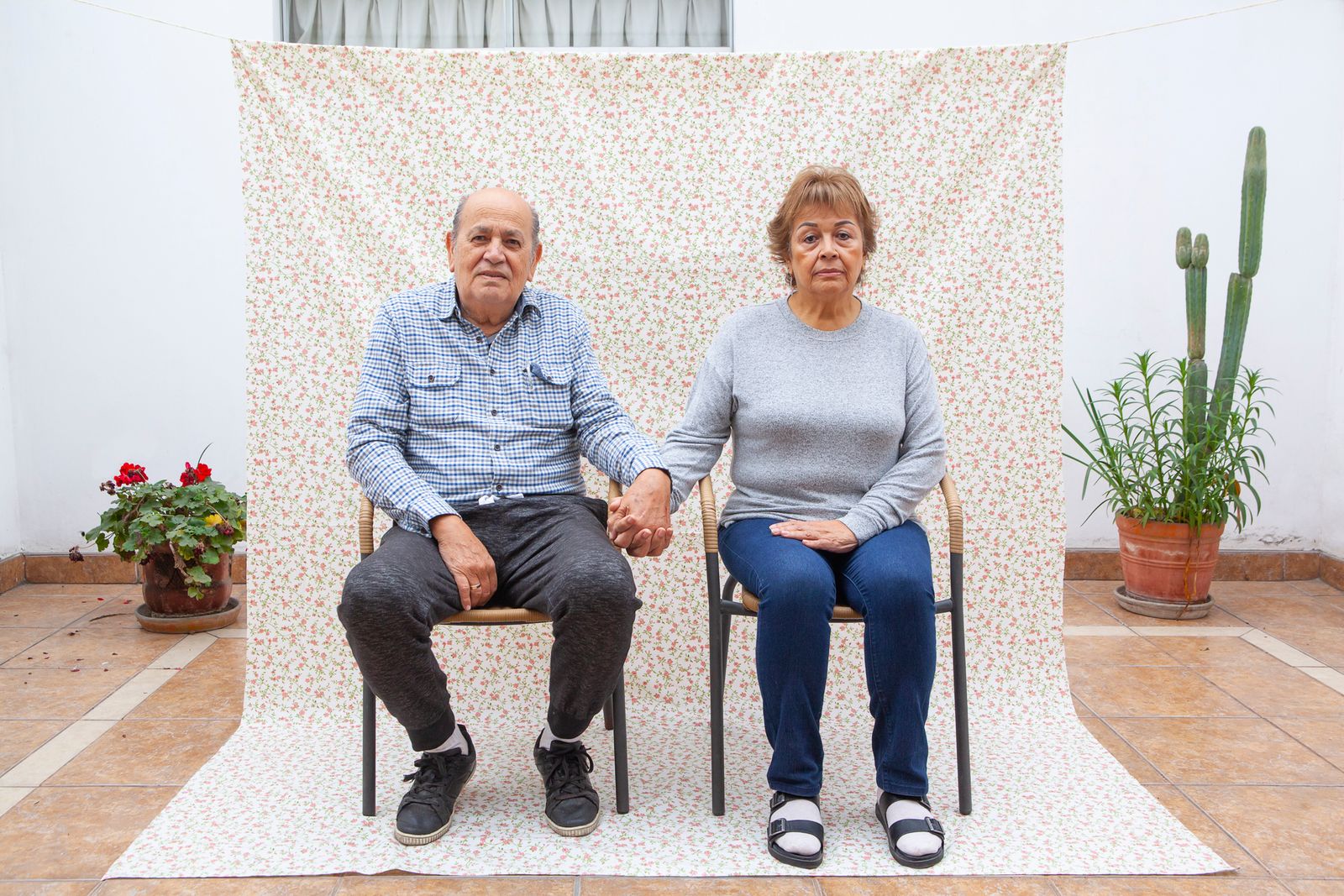 © Rochi  Leon - My parents sit and pose for a portrait in the patio.