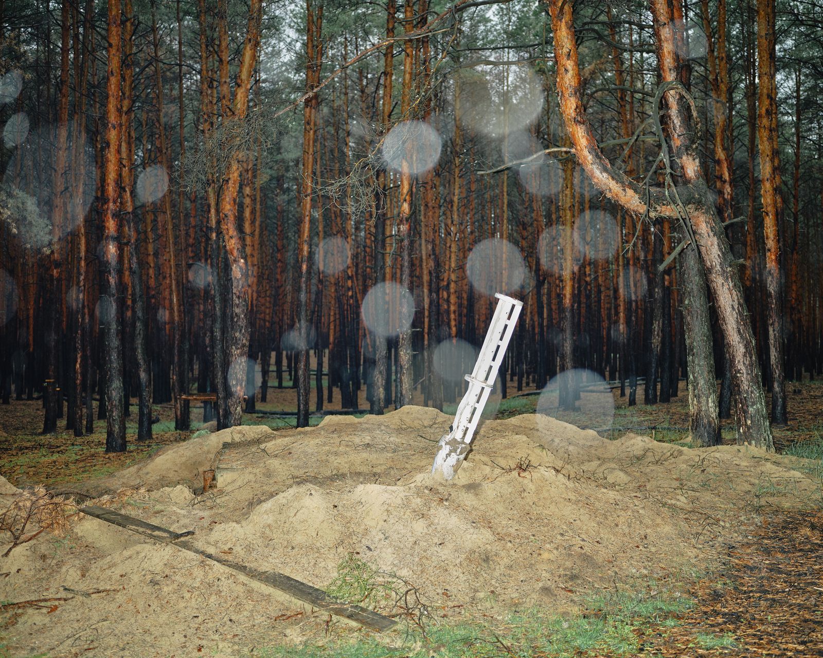 © Marcin Kruk - Izium, 11/10/2022, Wreckage of a rocket in the Izium forest.