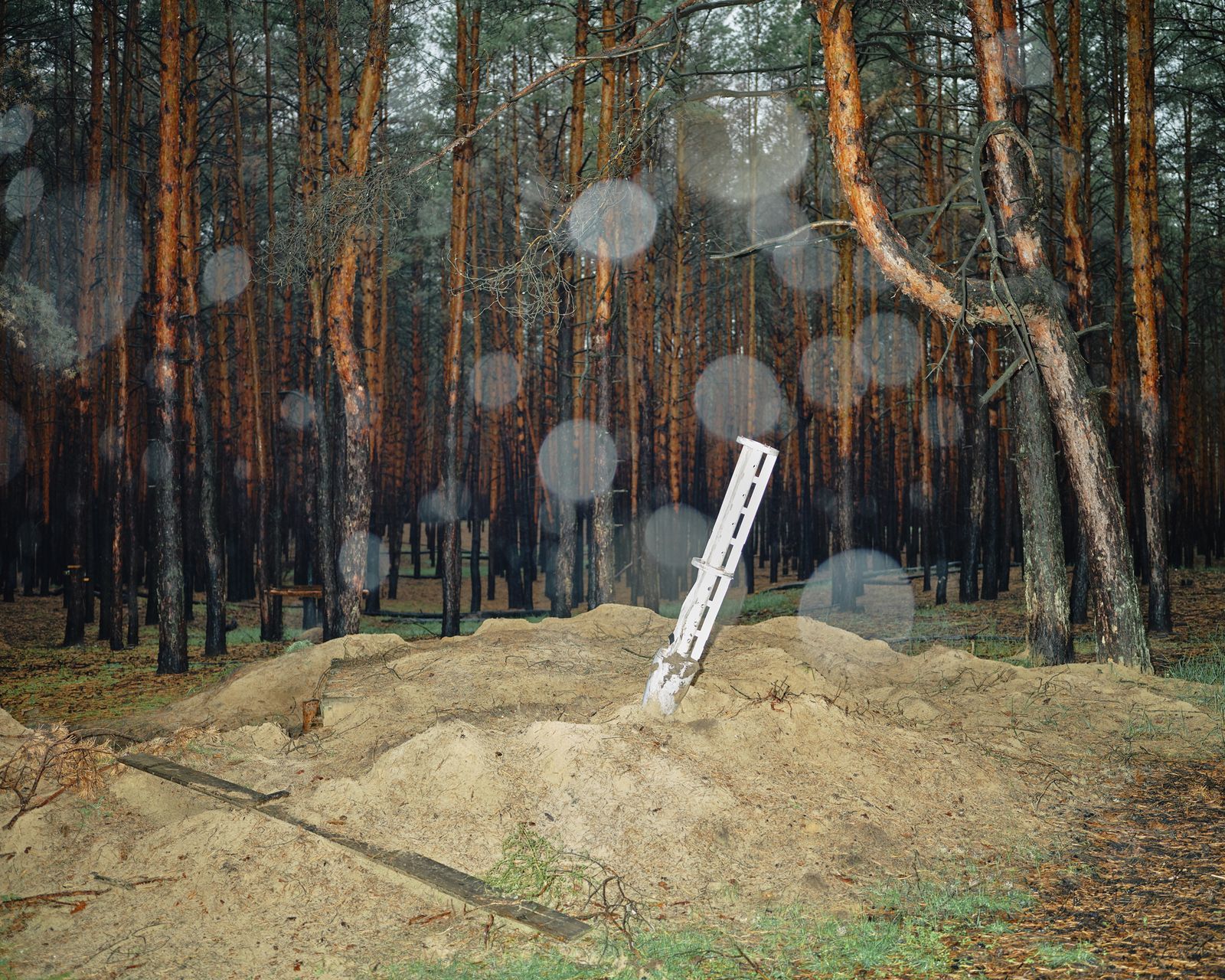 © Marcin Kruk - Izium, 11/10/2022, Wreckage of a rocket in the Izium forest.