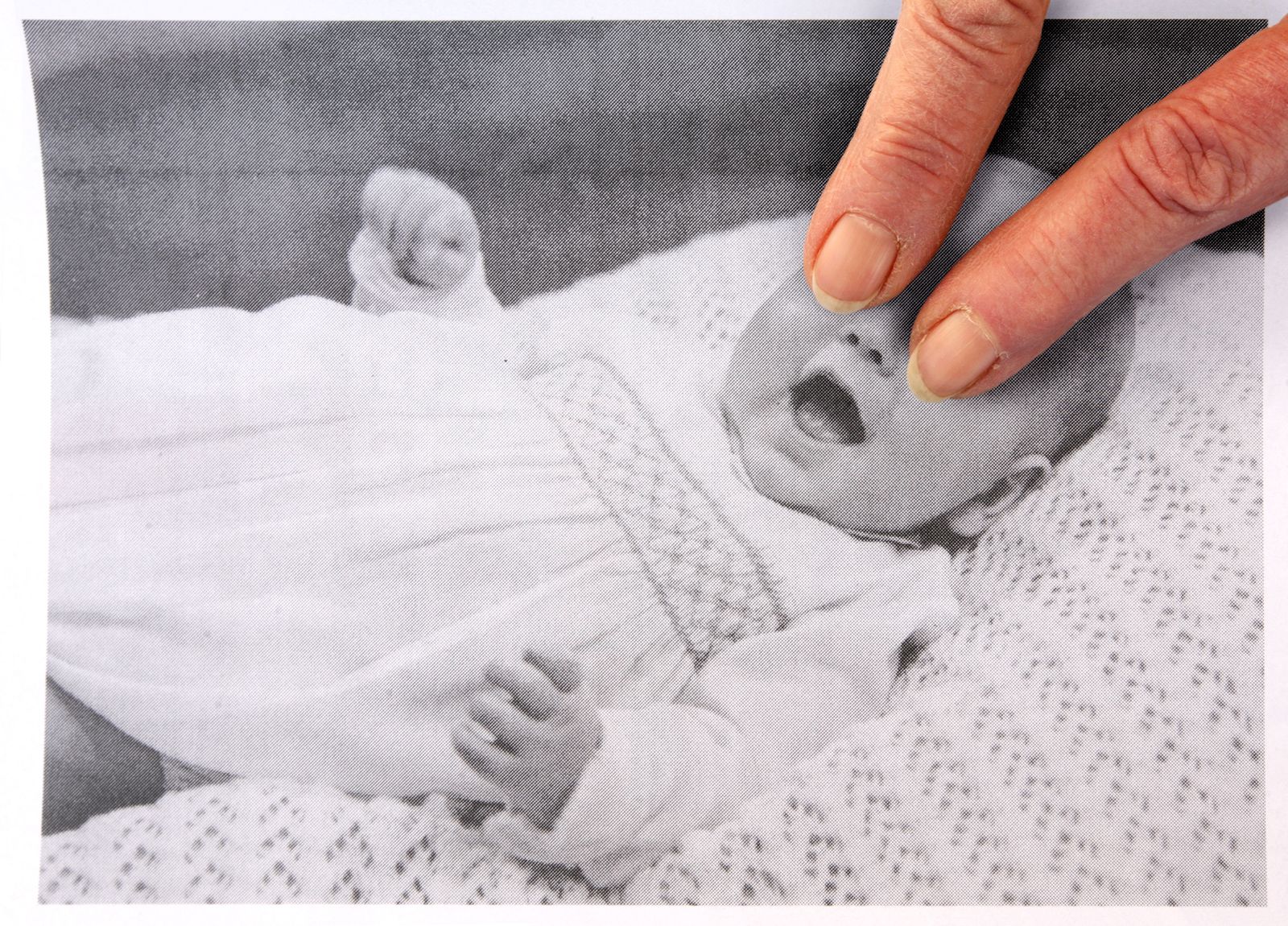 © Jonny Briggs - I can't see you (my mum's fingers over a photograph of my dad)