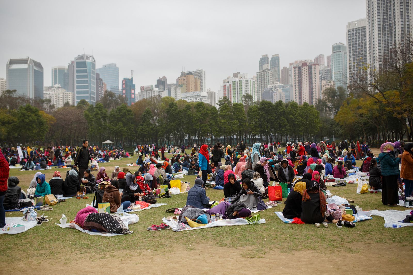 © Rebecca Sampson - Gathering of Indonesian housemaids on their day off - Victoria Park, Hong Kong