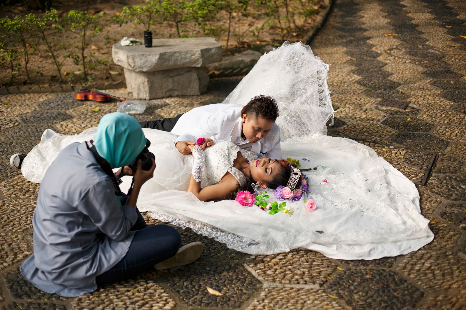 © Rebecca Sampson - Muslim, tomboy and beauty queen come together to document a mock wedding ceremony