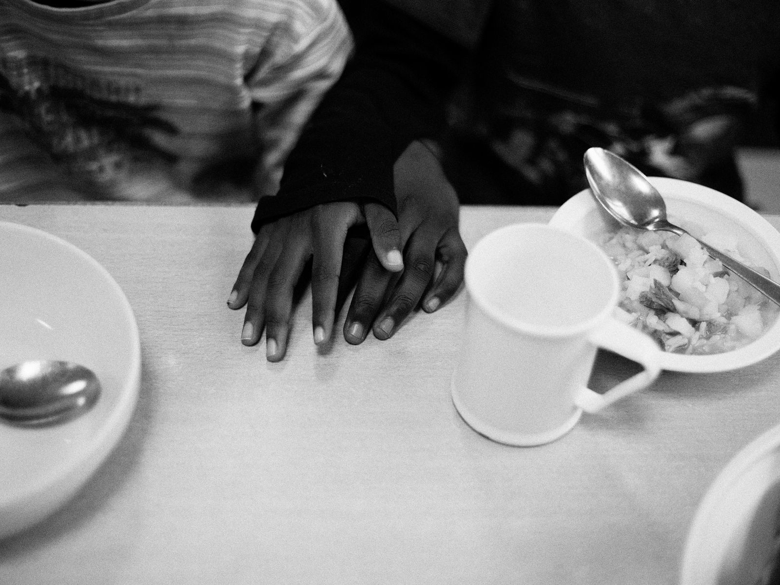 © Toby Binder - Friendship and solidarity in the dining room of the children's home.