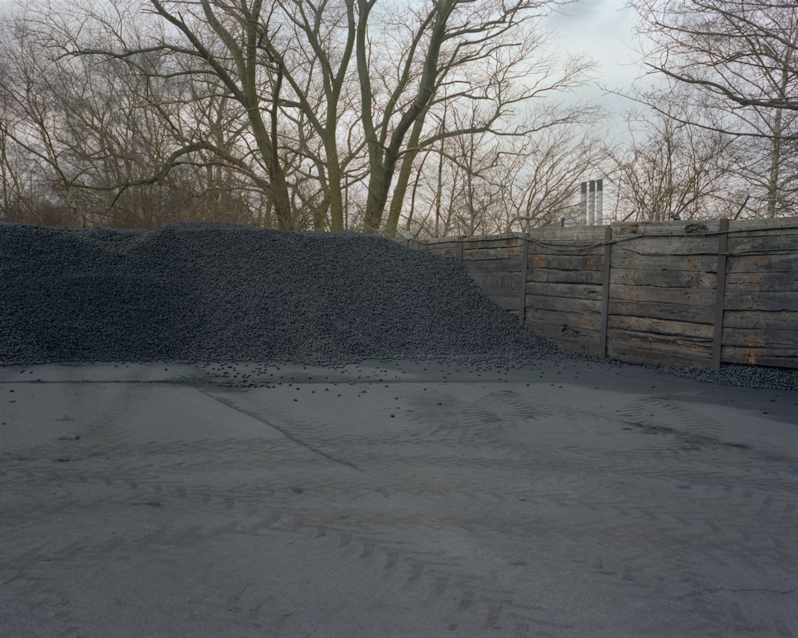 © David Severn - Coal piled at a fuel distribution depot on the site of the former Mansfield Crown Farm Colliery.
