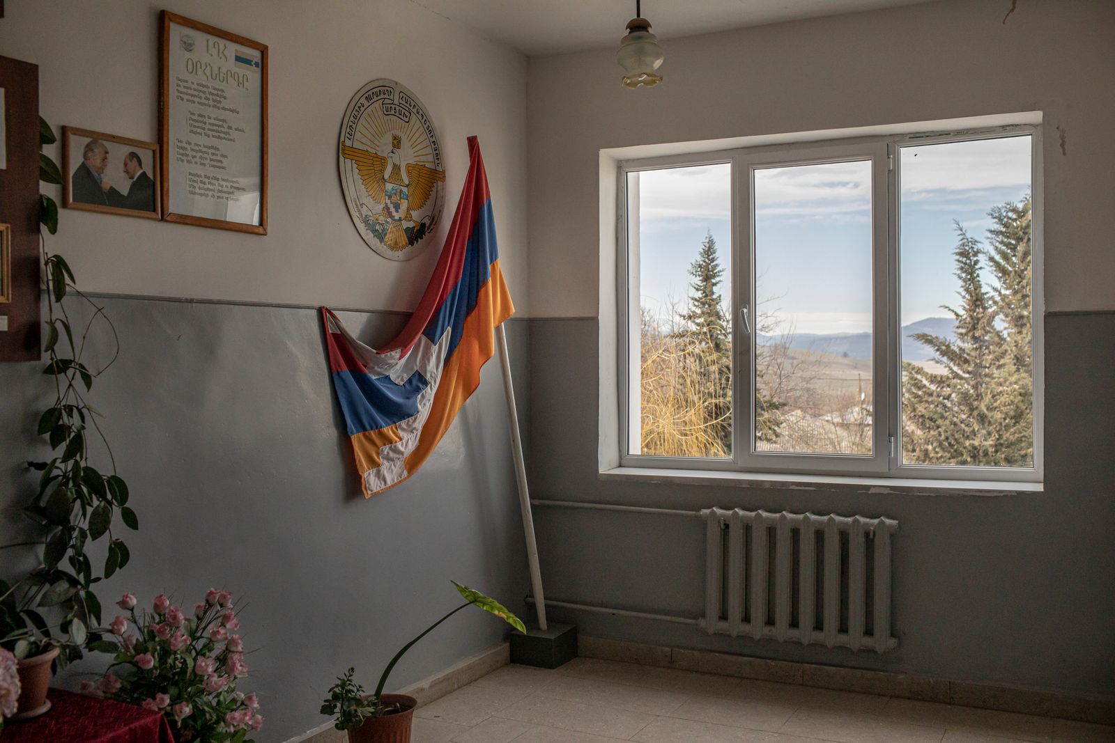 © Anush Babajanyan - The flag of Nagorno Karabakh is seen in the hallway of the Shekher village school, on February 28, 2020.