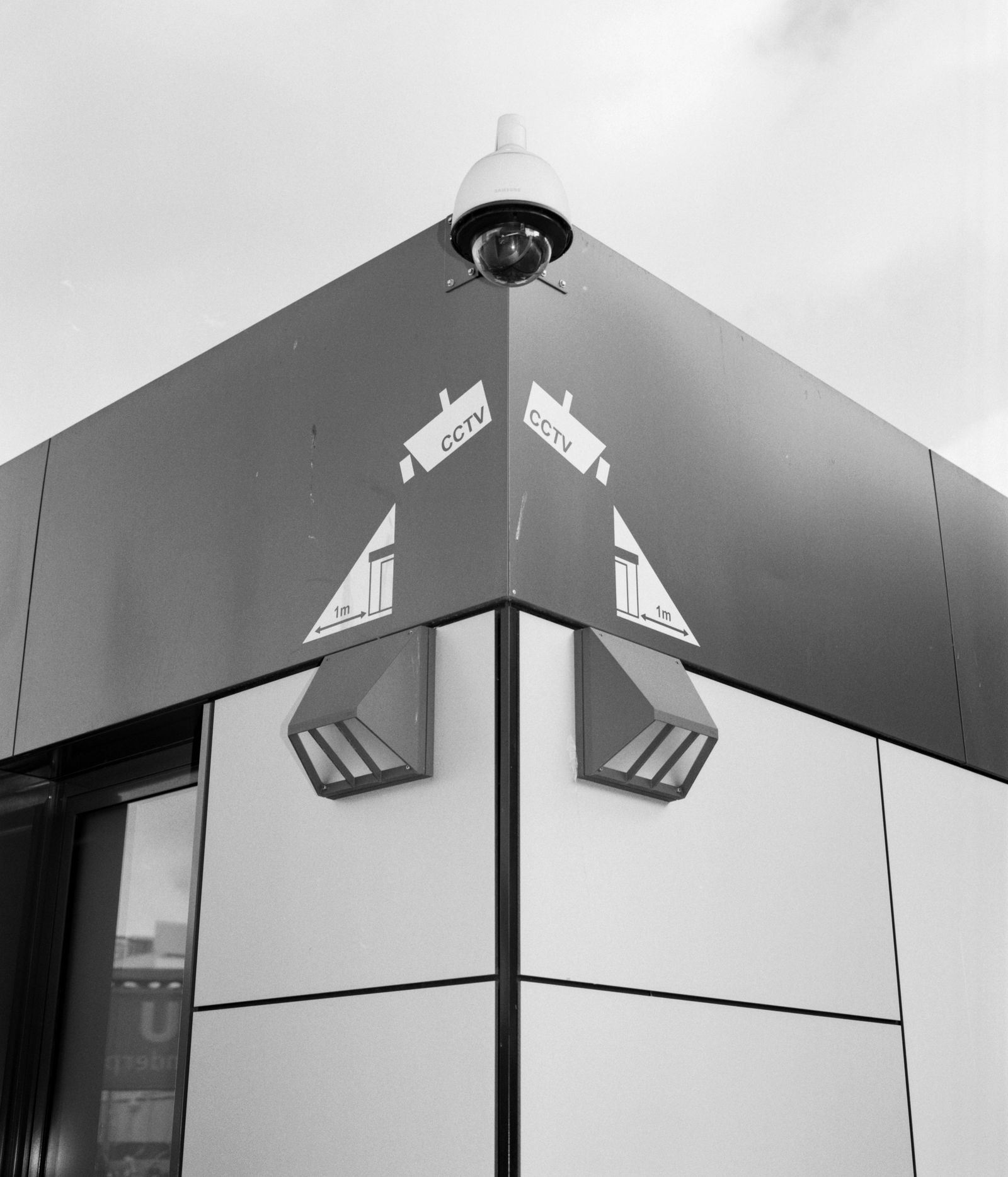 © Max Ferdinand Langer - Surveillance camera on the outside wall of a police station in Berlin