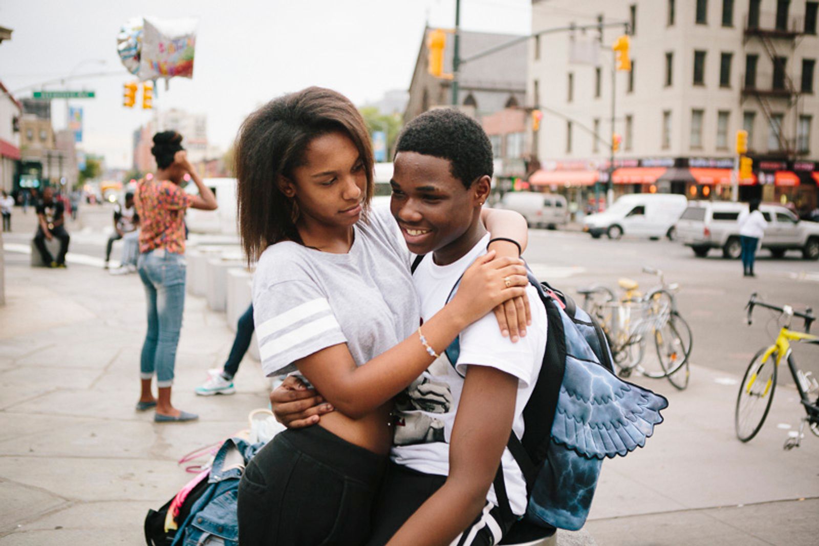 © Cassandra Giraldo - Raquelle and Alonzo hang out near Barclay's Center in Brooklyn, New York after school on September 29, 2014.