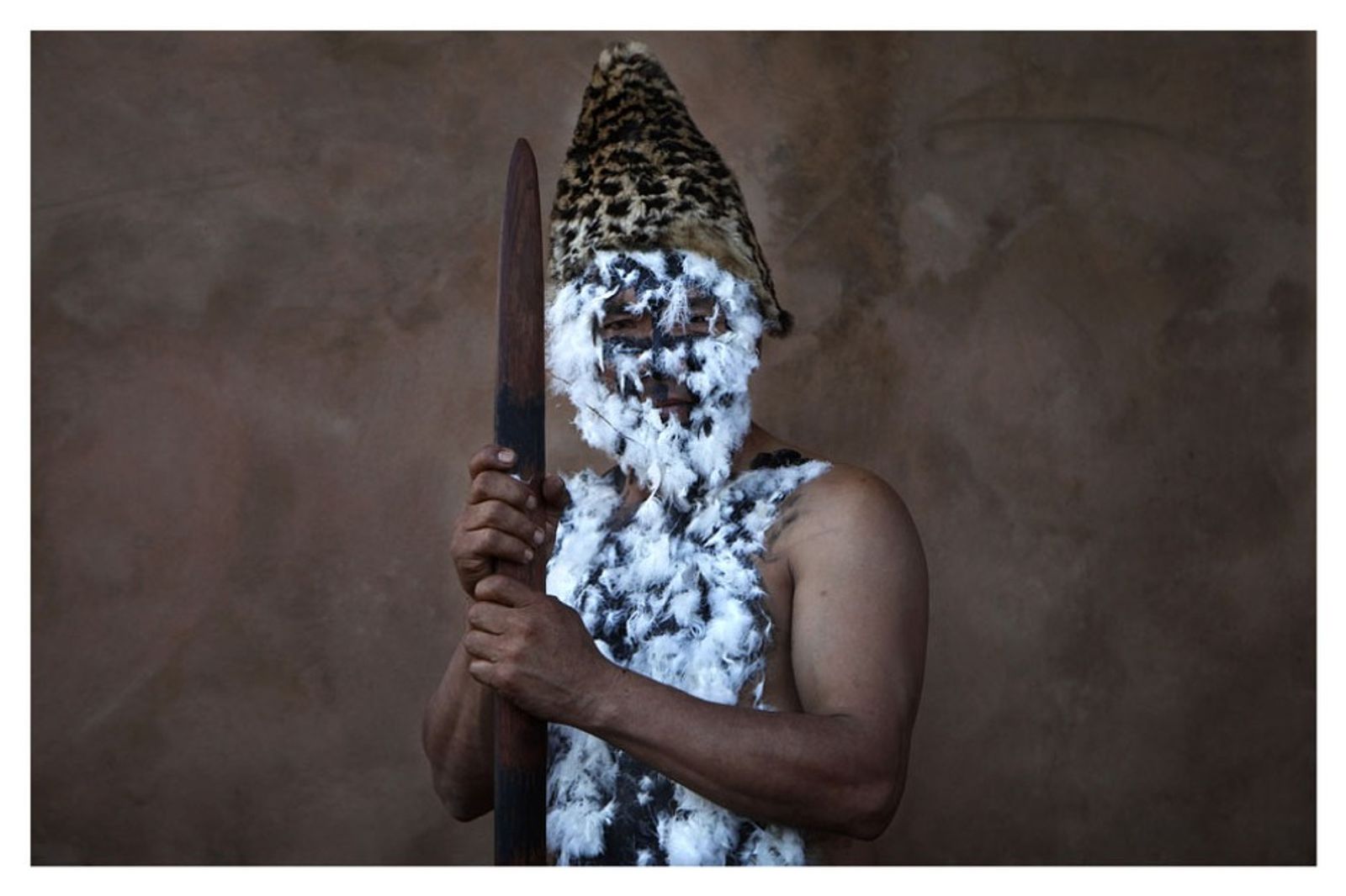 © Jorge Saenz - An Ache indigenous man participates of a burial ceremony at Ypetimi, Paraguay, June 1, 2010.