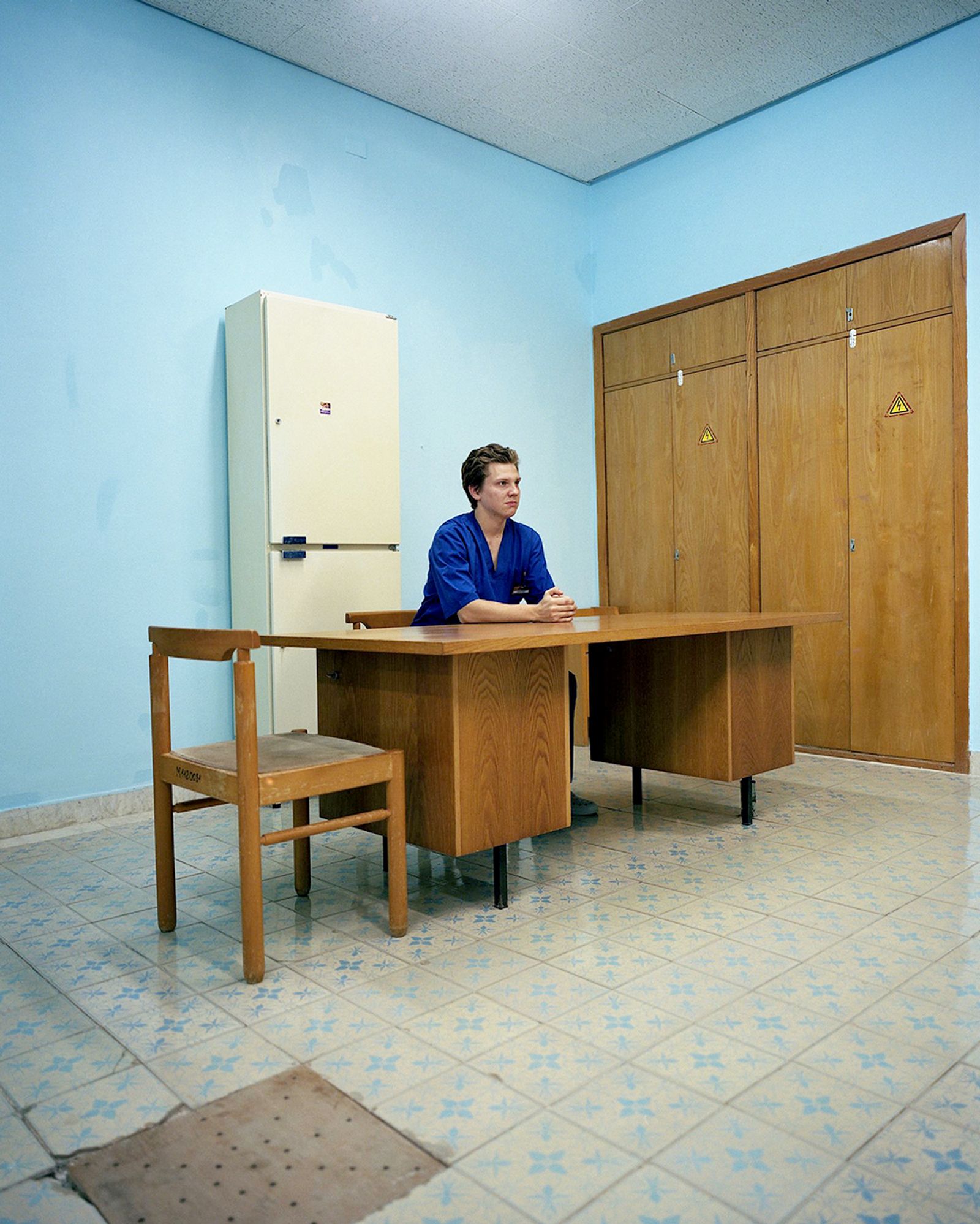 © Michal Solarski - Dima. A doctor awaiting patients at Foros sanatorium. August 2016, Crimea.